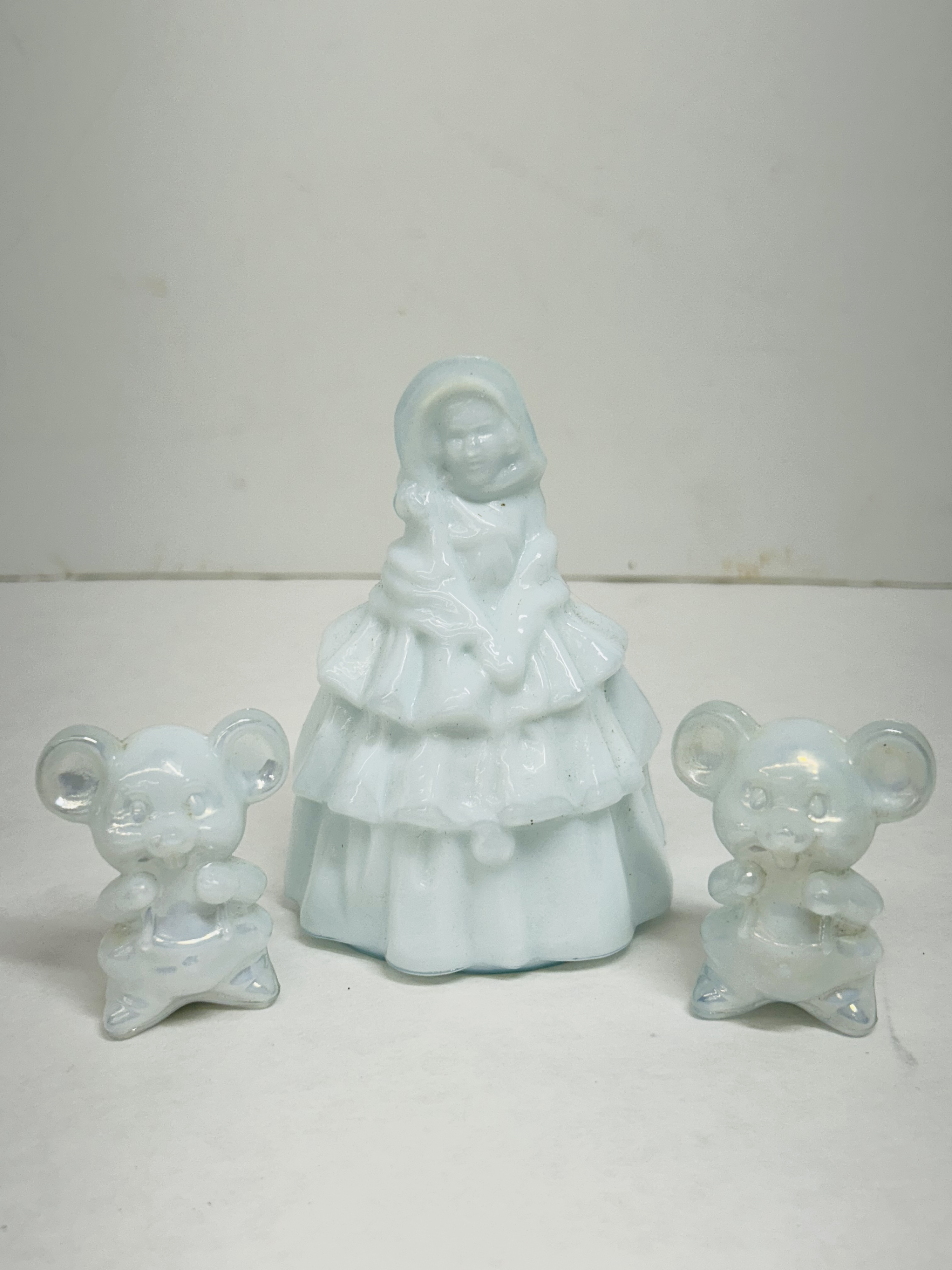 WHITE BOYD FIGURINES (3)