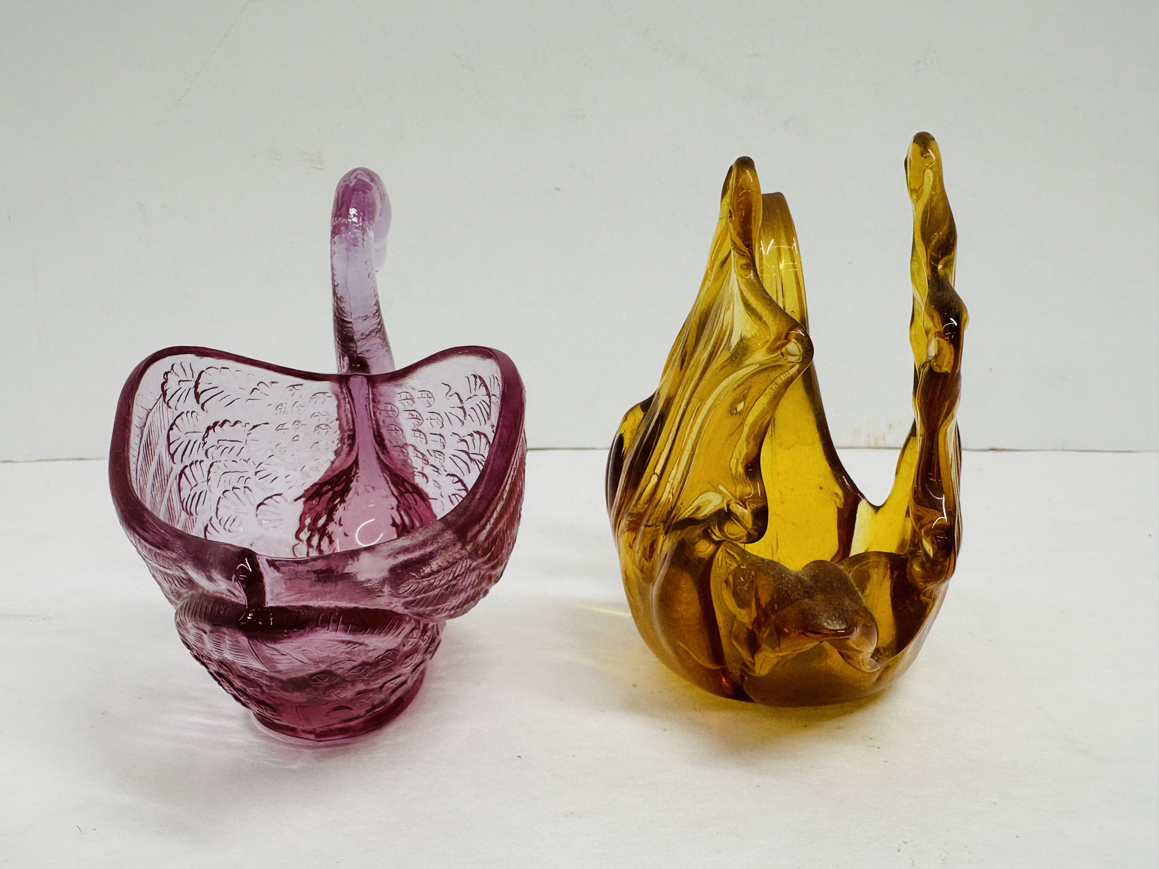 FENTON AND AMBER GLASS SWANS, 1999