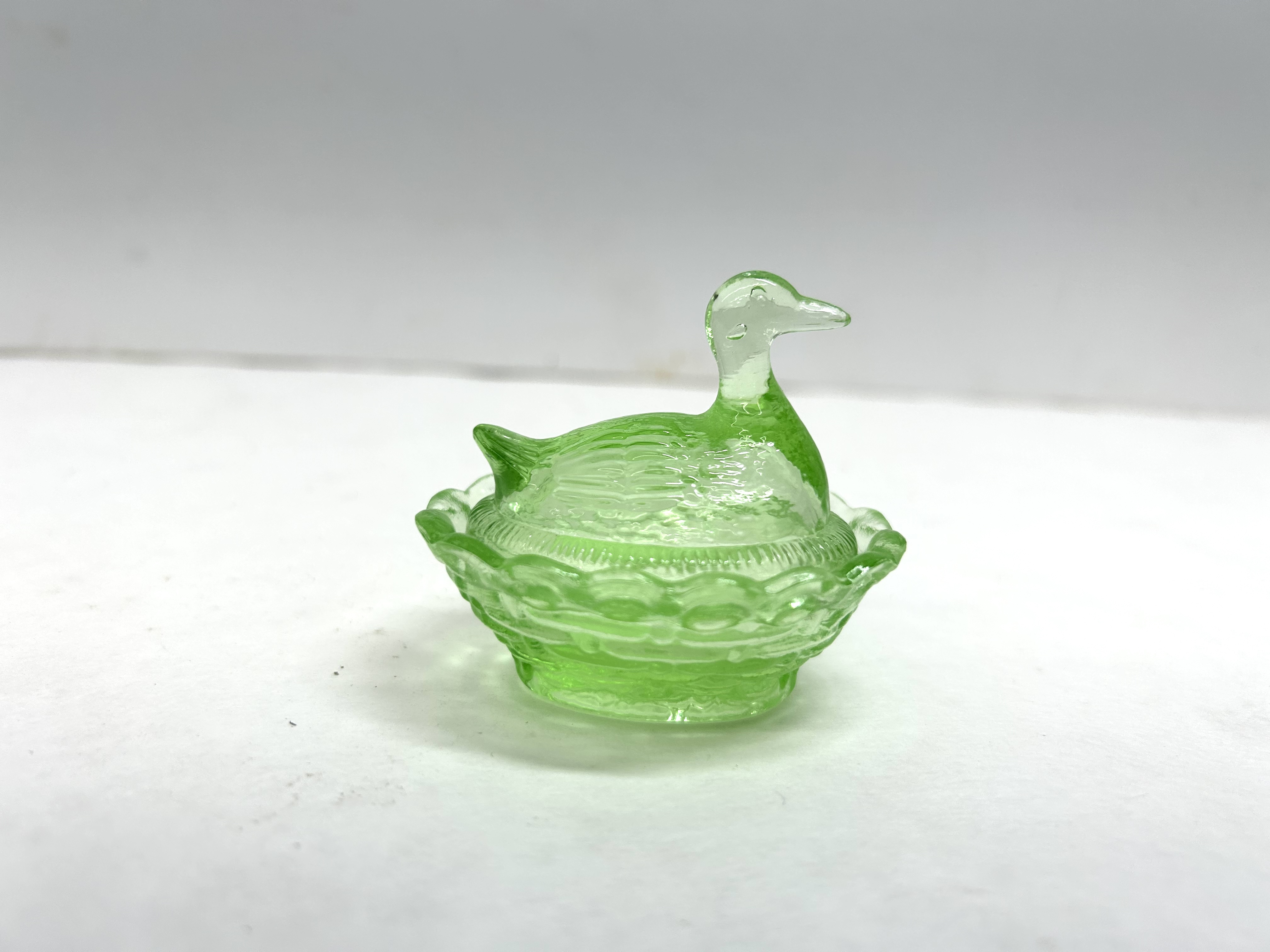 BOYD URANIUM GLASS DUCK ON NEST