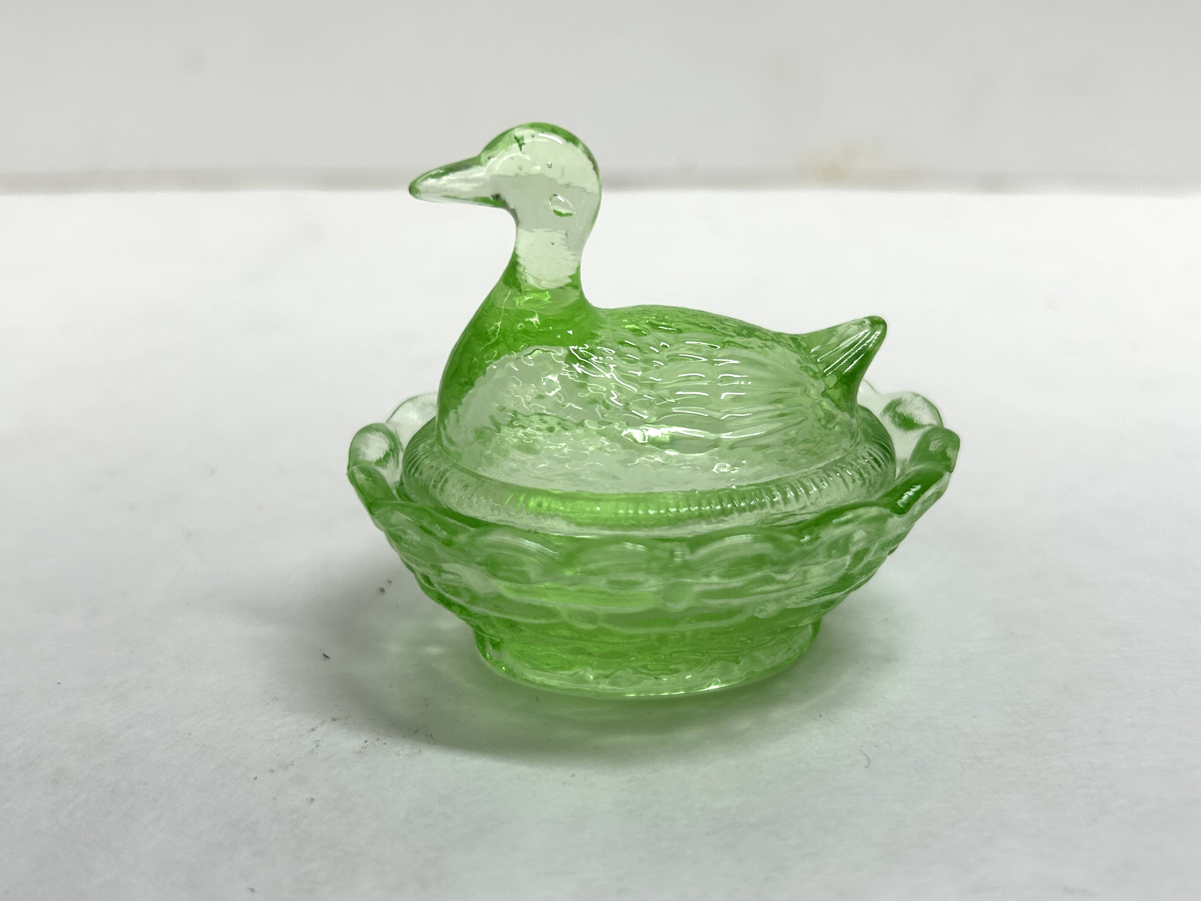 BOYD URANIUM GLASS DUCK ON NEST