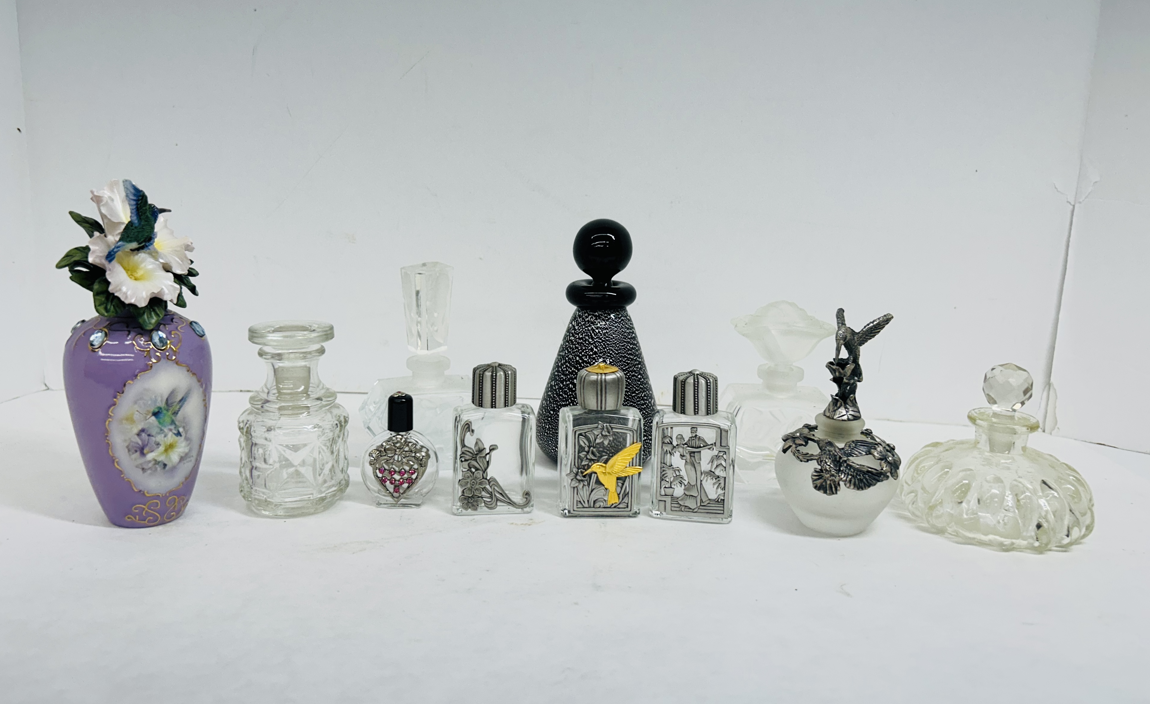 COLLECTION OF ELEVEN PERFUME BOTTLES