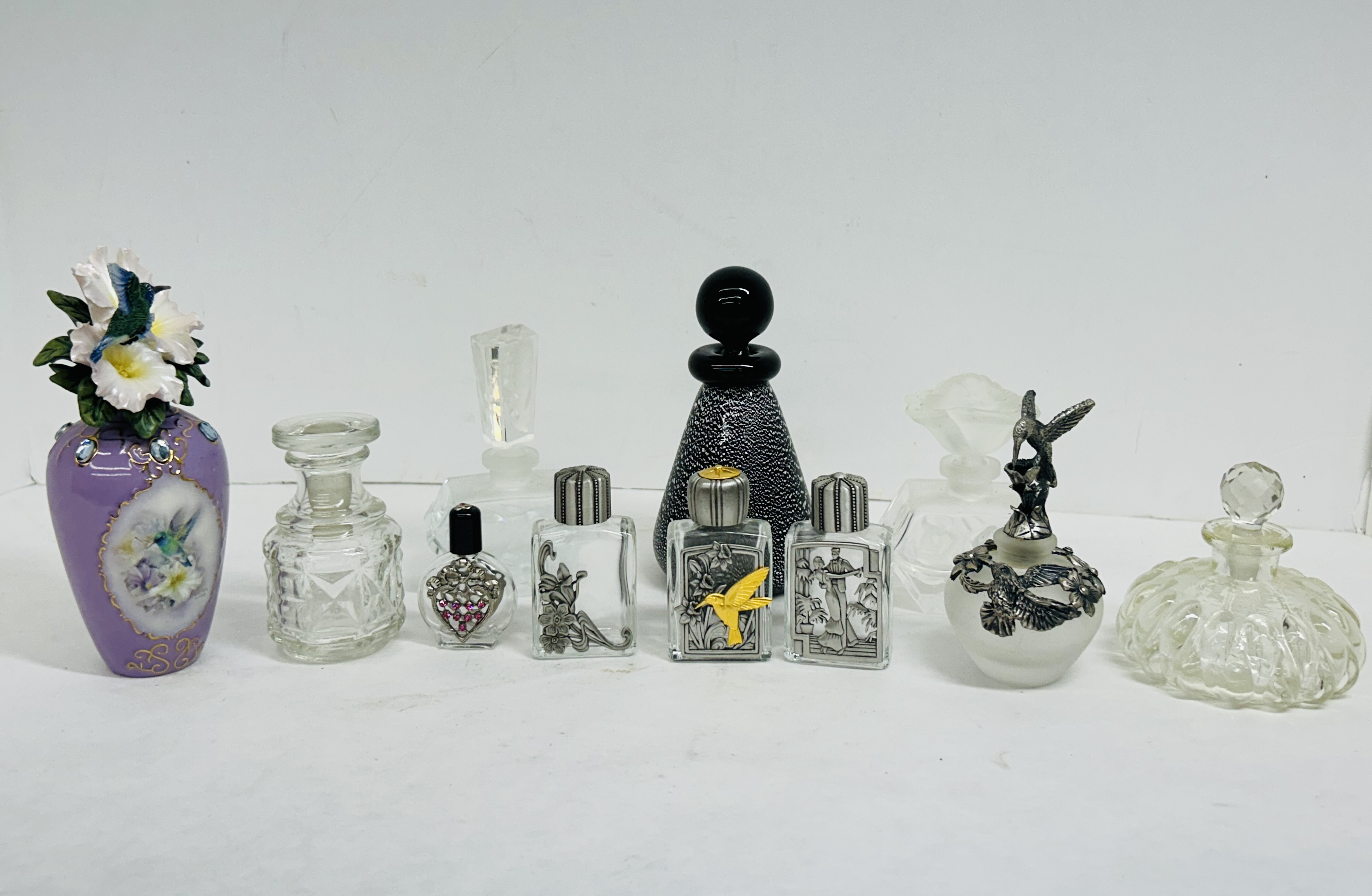 COLLECTION OF ELEVEN PERFUME BOTTLES