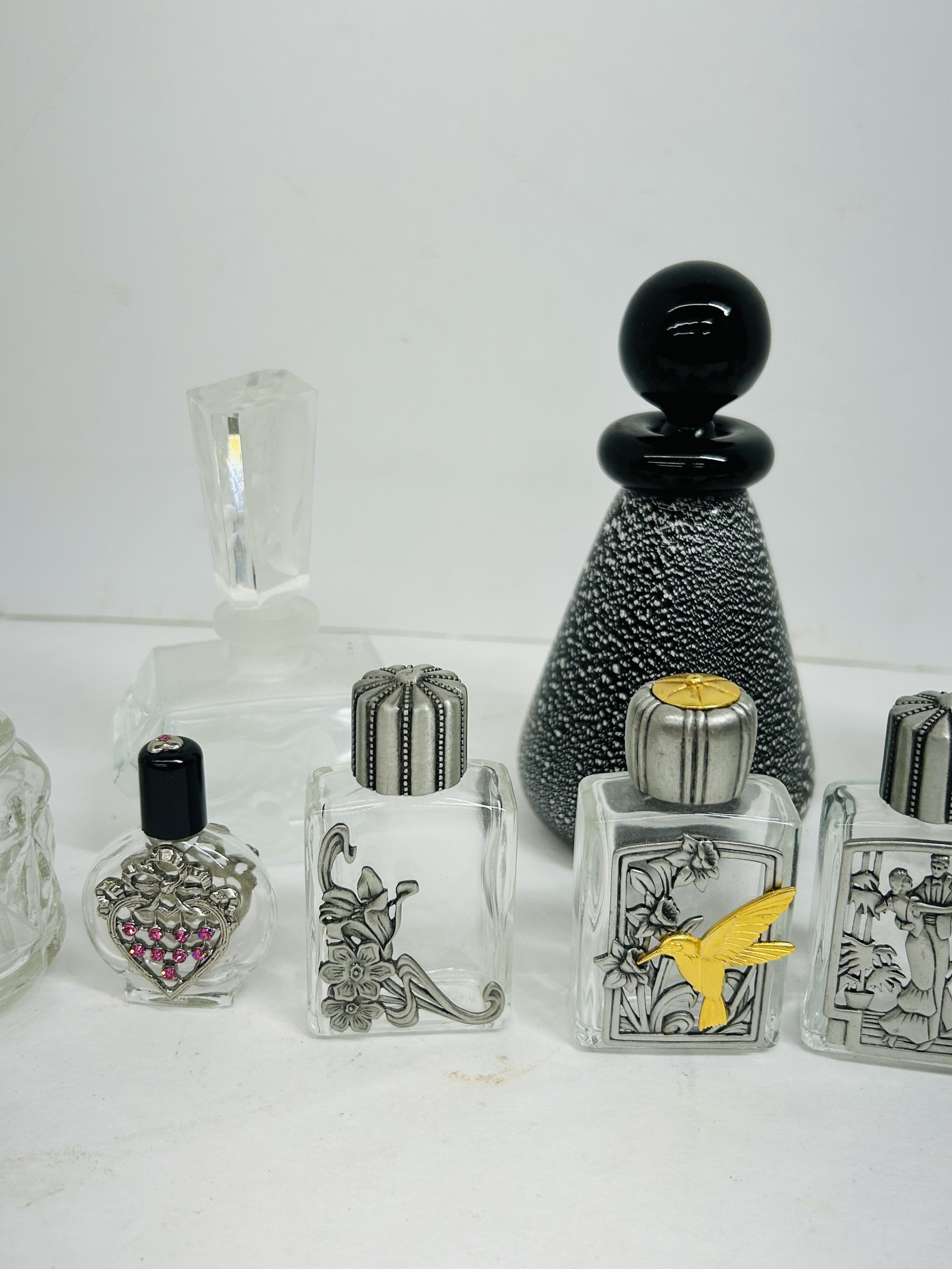 COLLECTION OF ELEVEN PERFUME BOTTLES