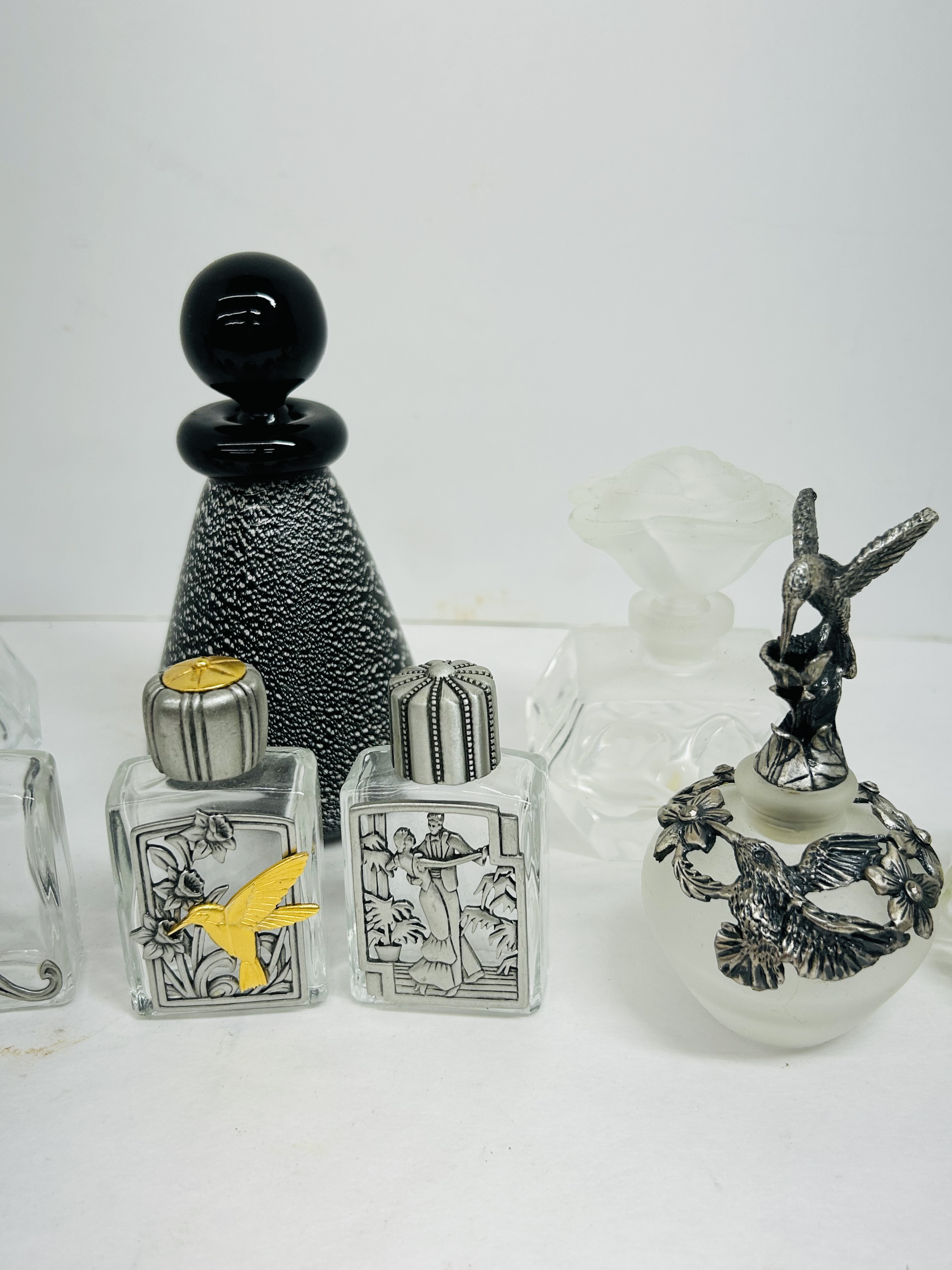 COLLECTION OF ELEVEN PERFUME BOTTLES