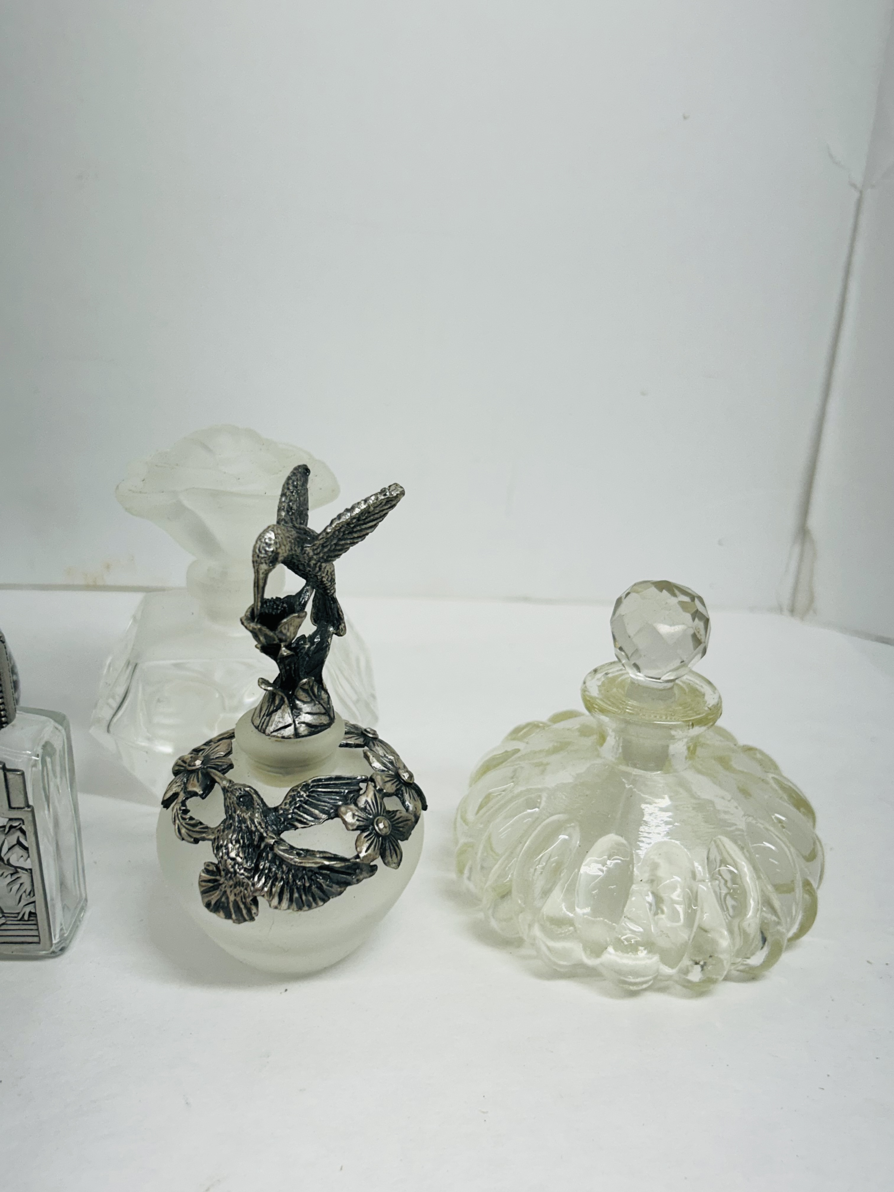 COLLECTION OF ELEVEN PERFUME BOTTLES