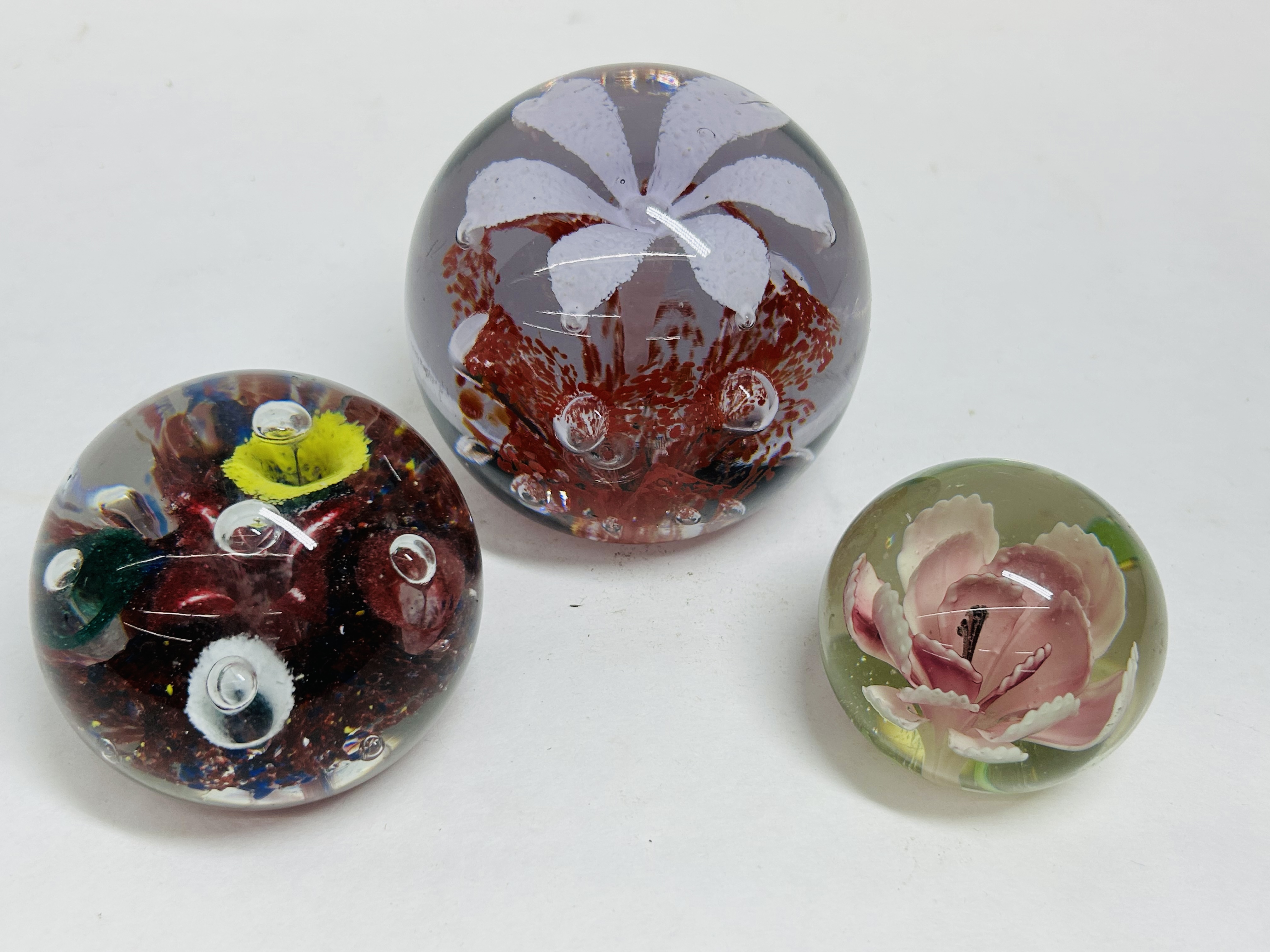 THREE FLORAL GLASS PAPERWEIGHTS, 20TH CENTURY