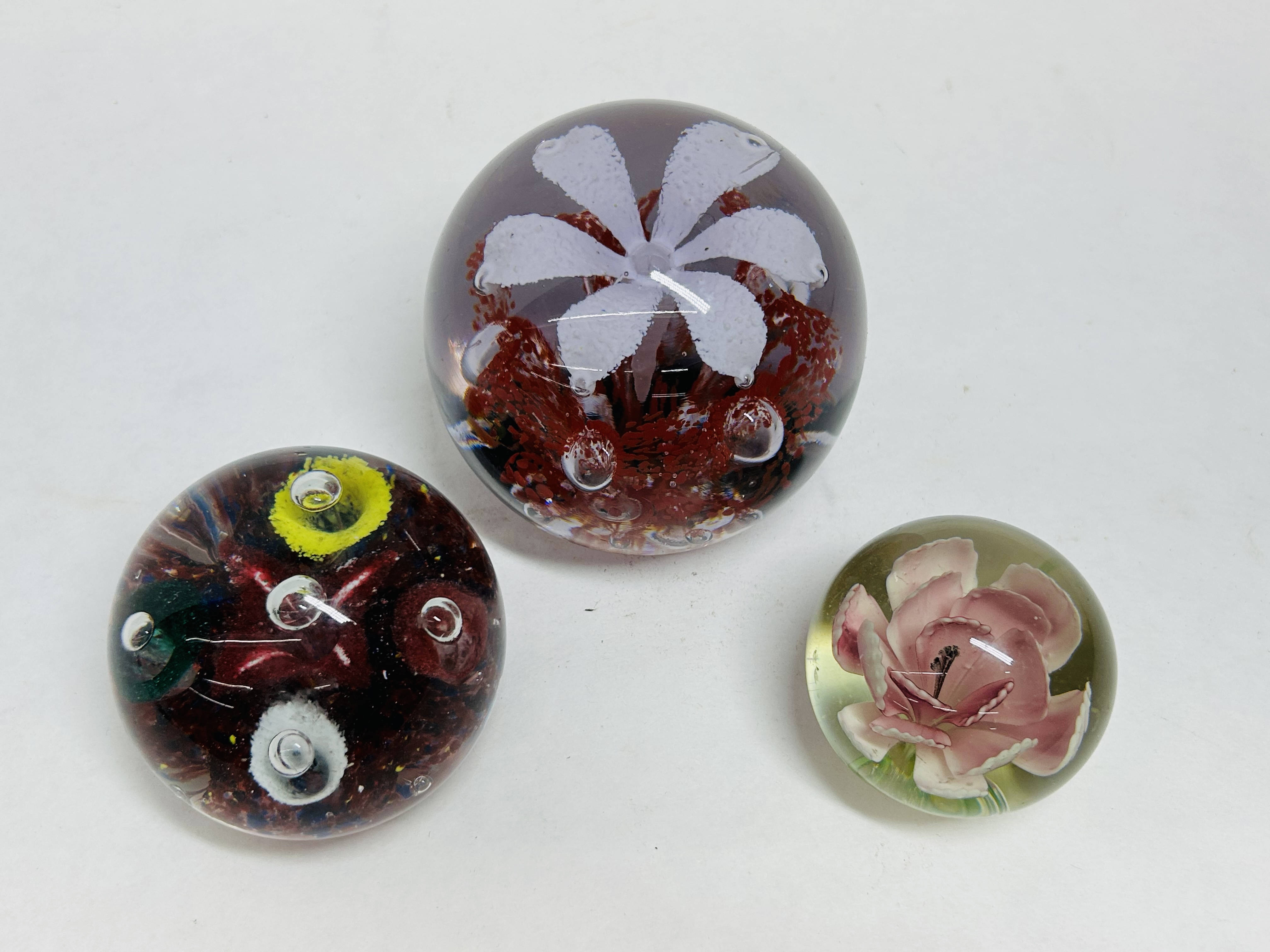 THREE FLORAL GLASS PAPERWEIGHTS, 20TH CENTURY