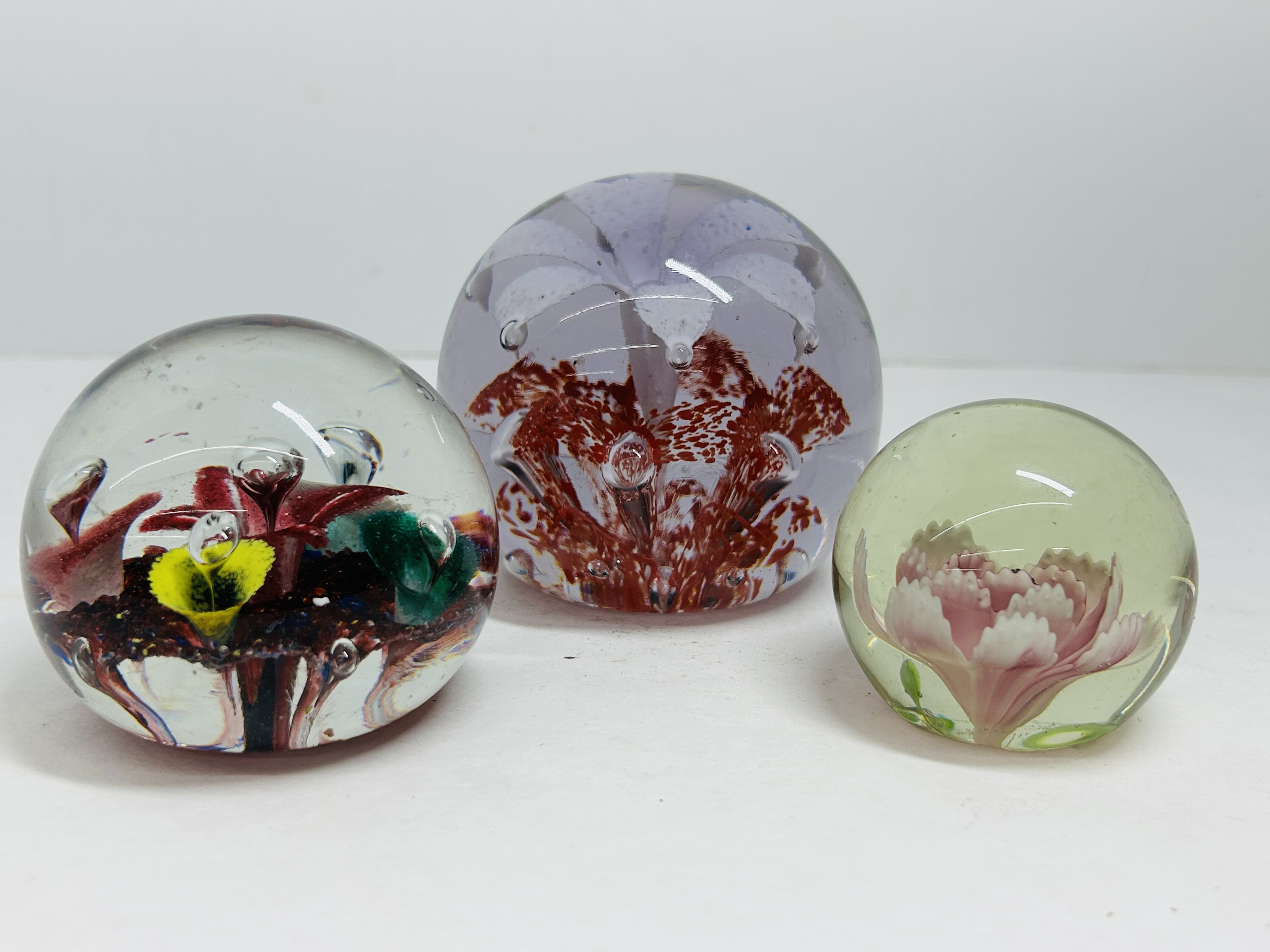 THREE FLORAL GLASS PAPERWEIGHTS, 20TH CENTURY