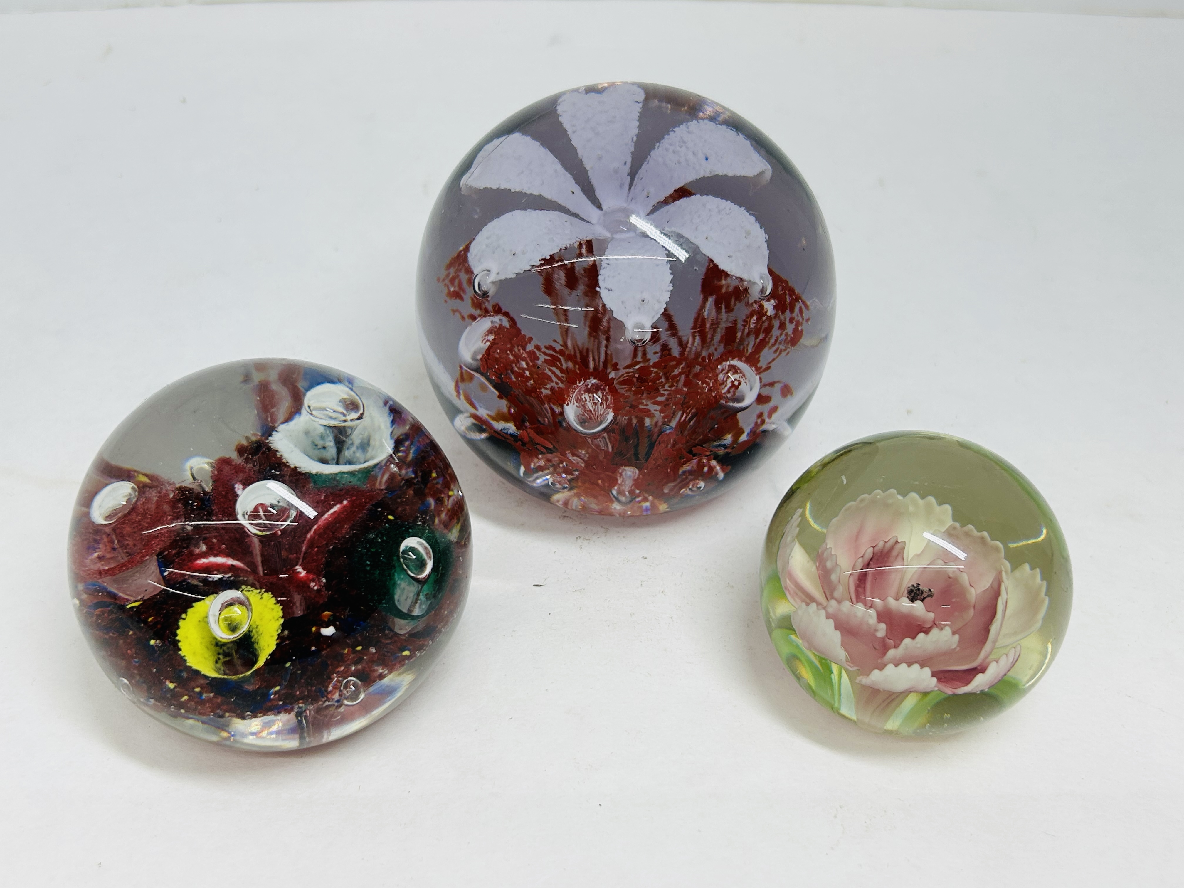 THREE FLORAL GLASS PAPERWEIGHTS, 20TH CENTURY