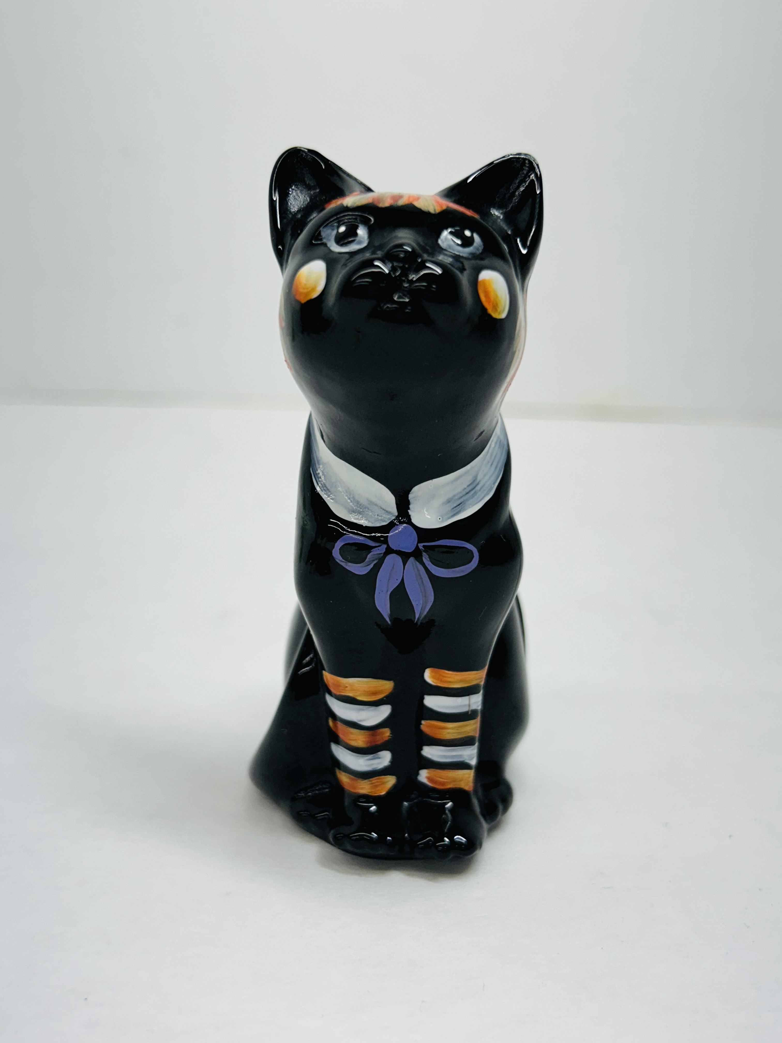 FENTON PAINTED BLACK GLASS CAT, 2007