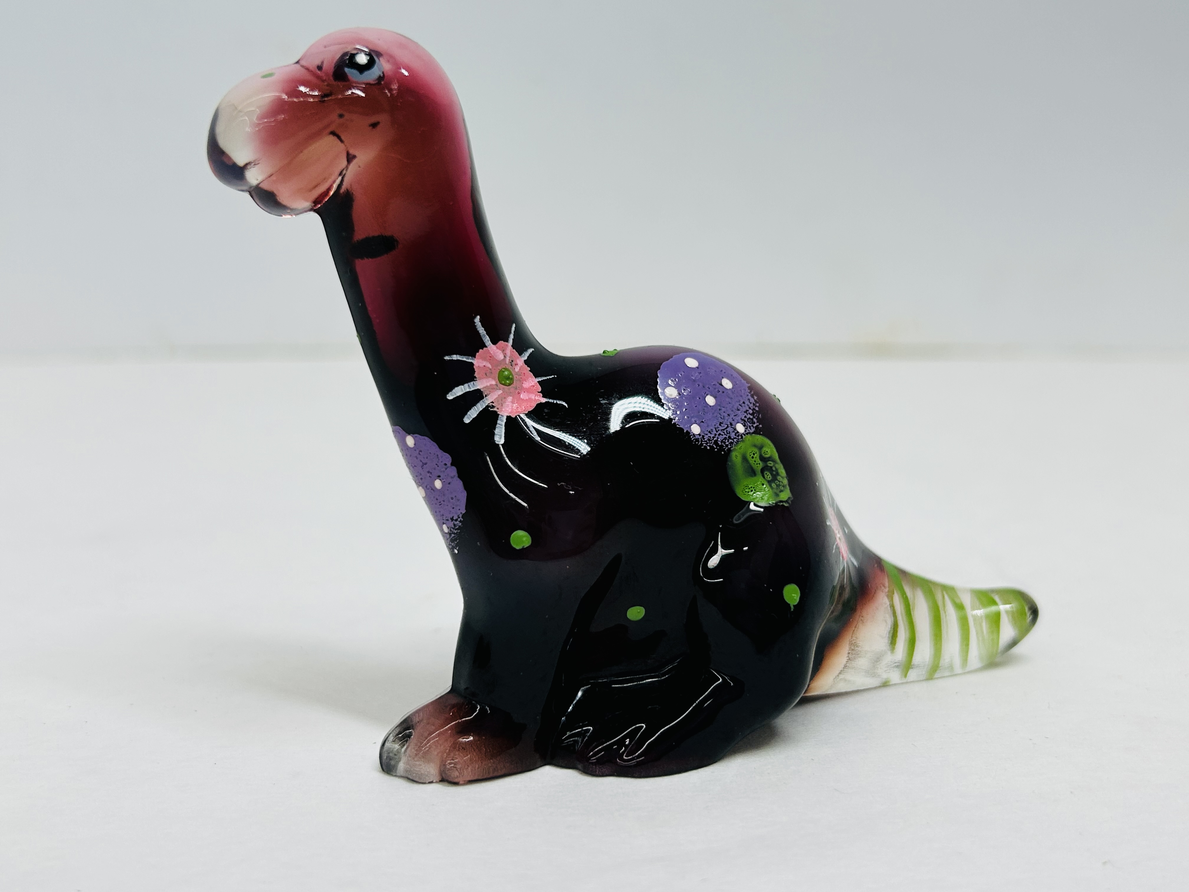 FENTON AMETHYST GLASS DINOSAUR, LATE 20TH CENTURY