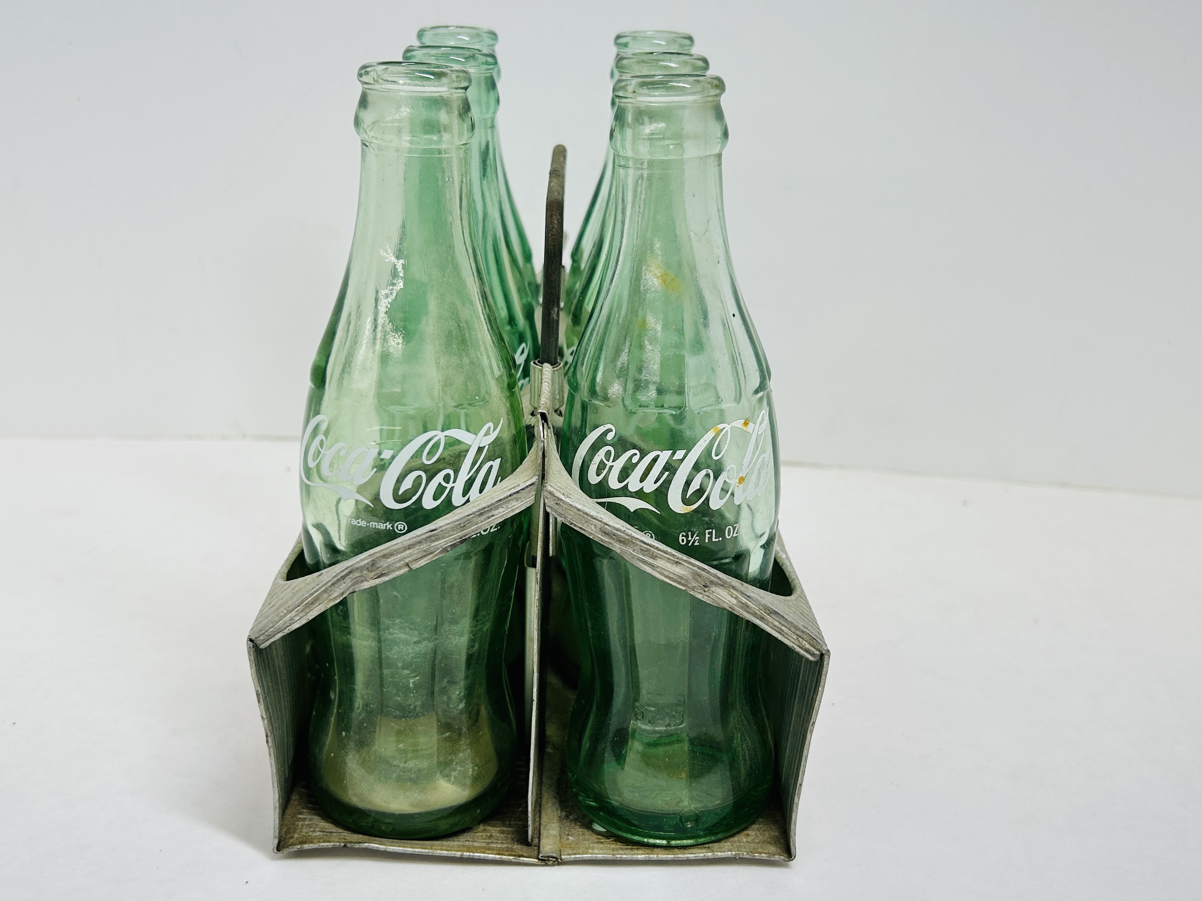 COCA-COLA ALUMINUM CARRIER AND BOTTLES