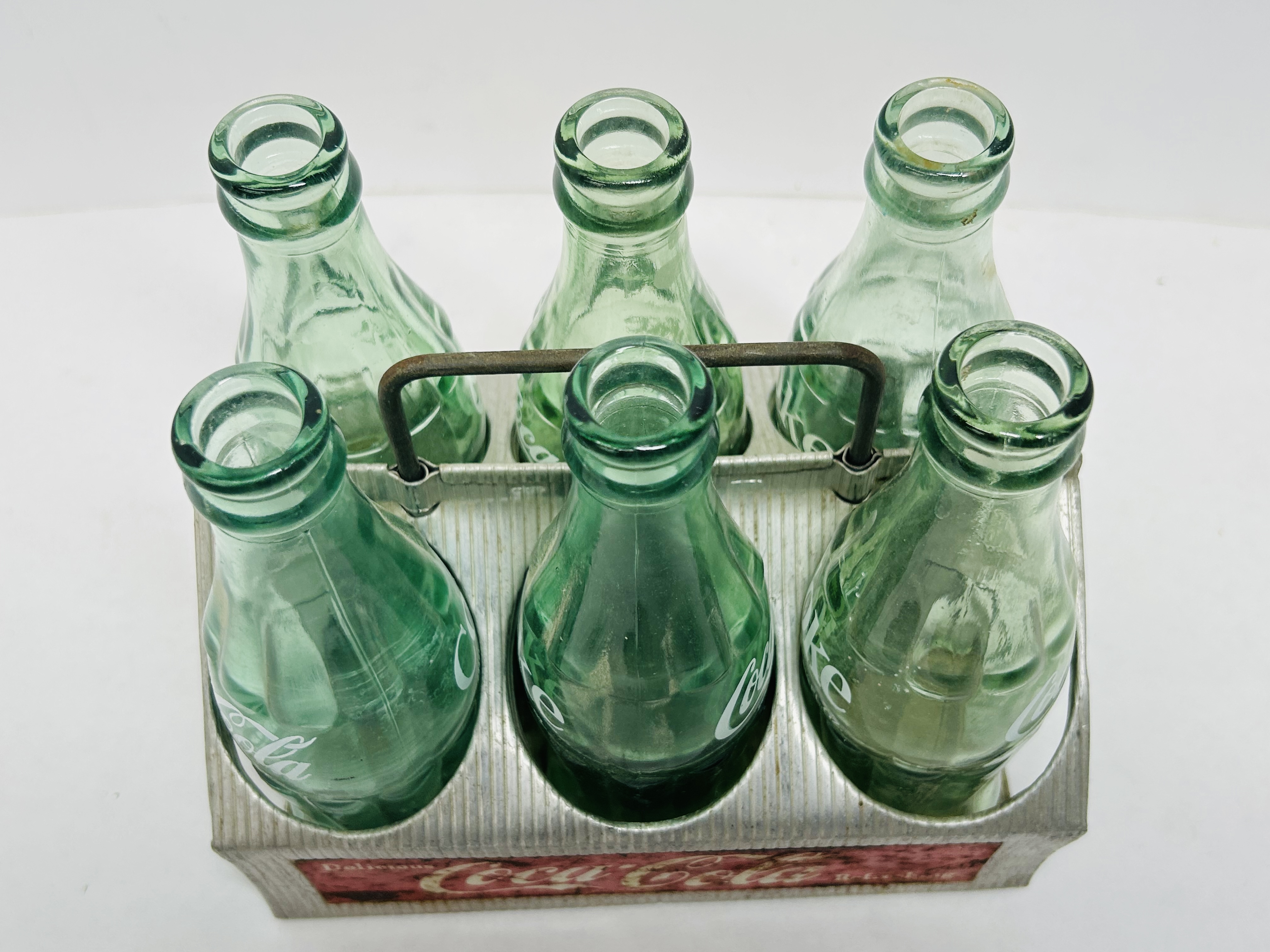 COCA-COLA ALUMINUM CARRIER AND BOTTLES