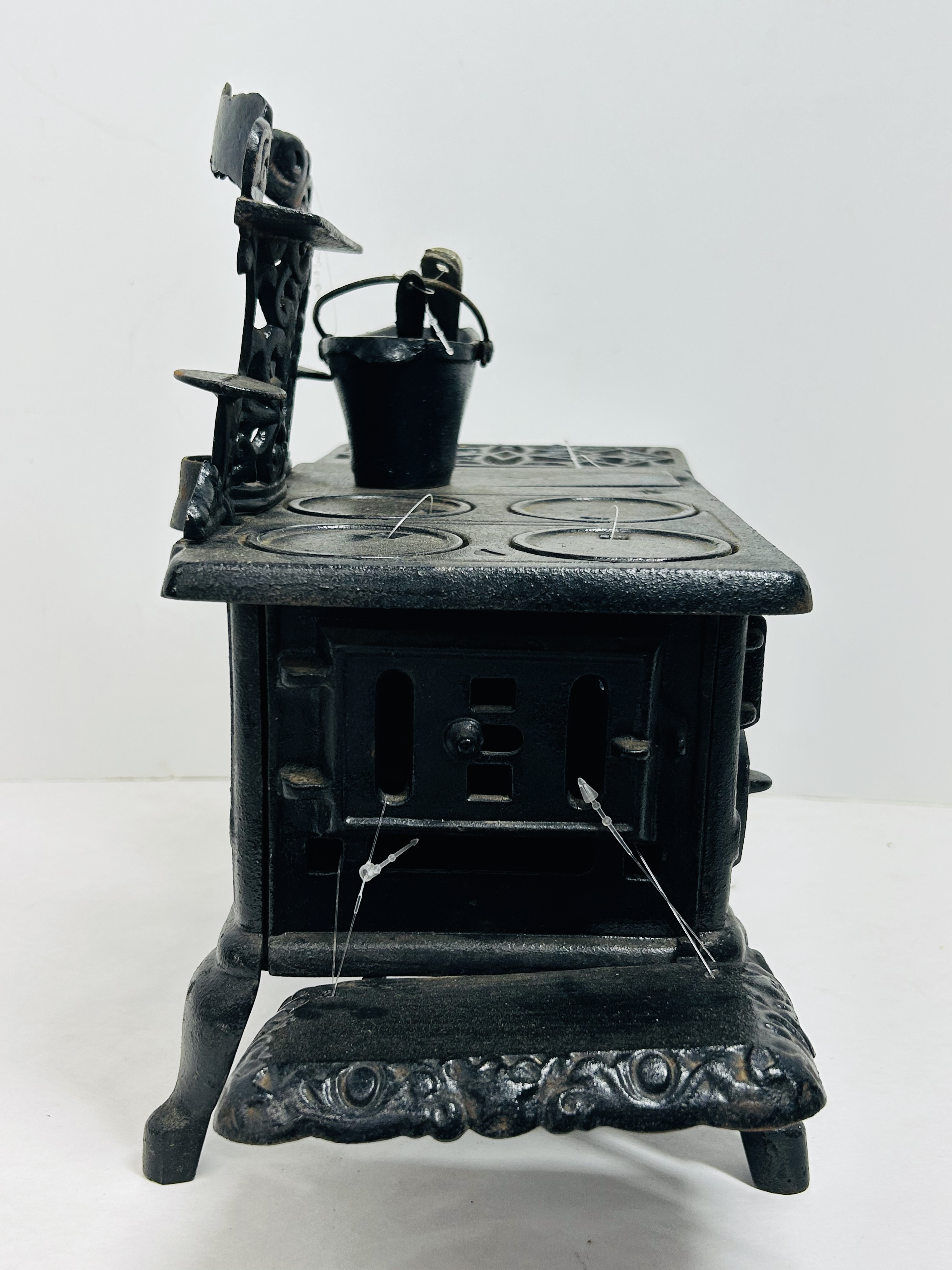CRESCENT CAST IRON MINIATURE STOVE CIRCA 1900