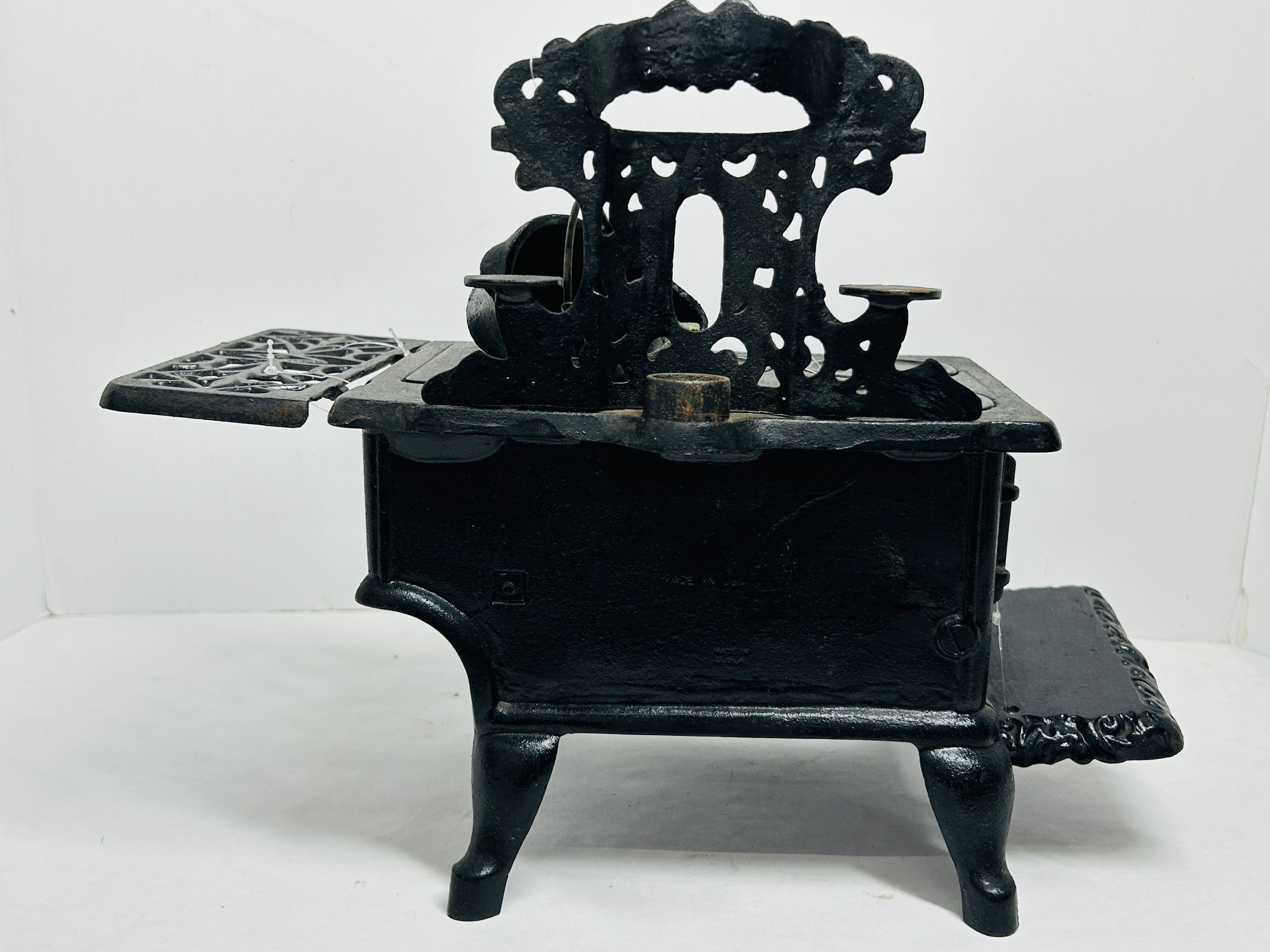 CRESCENT CAST IRON MINIATURE STOVE CIRCA 1900