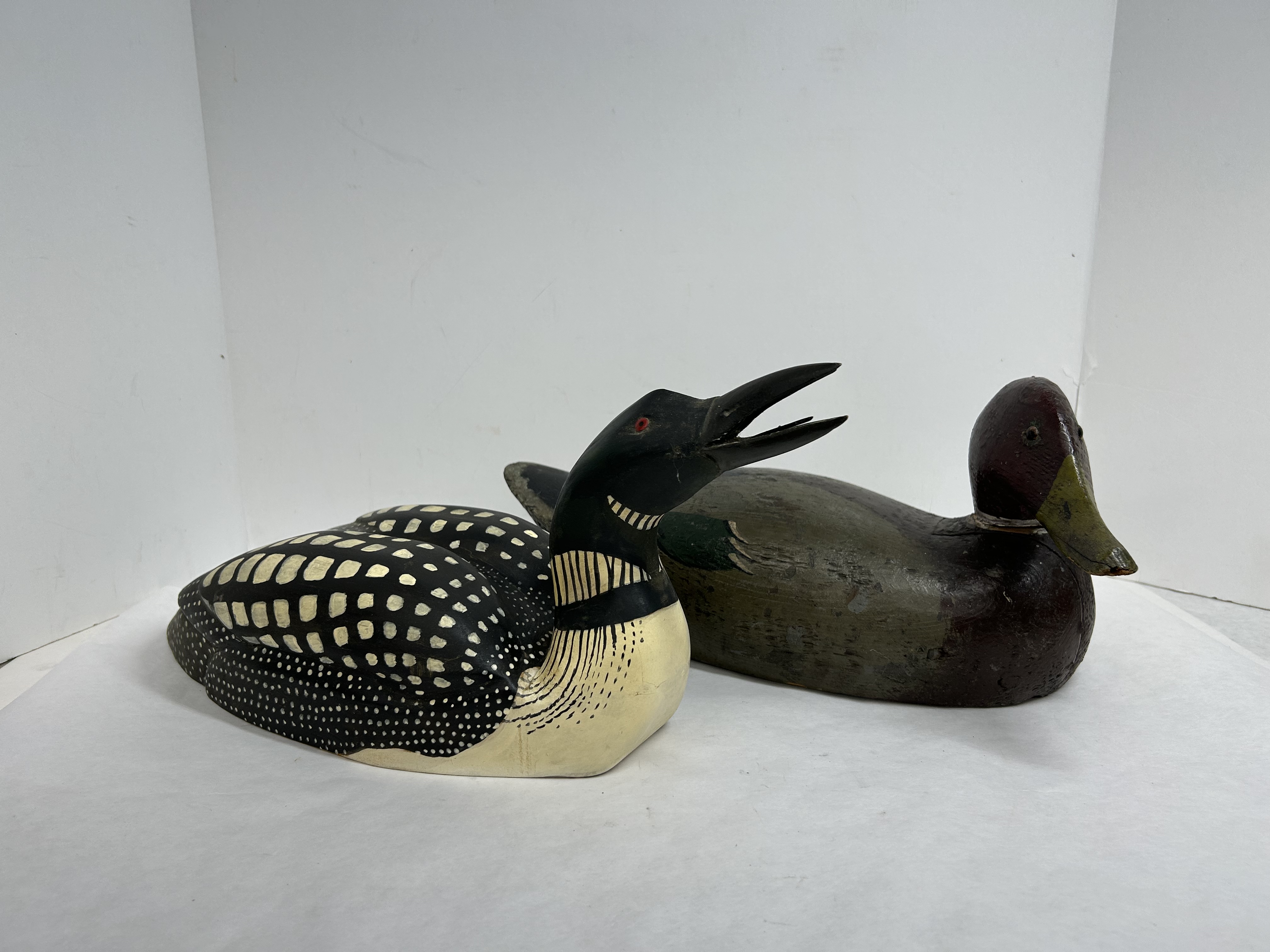 TWO WOODEN BIRD DECOYS, 20TH CENTURY