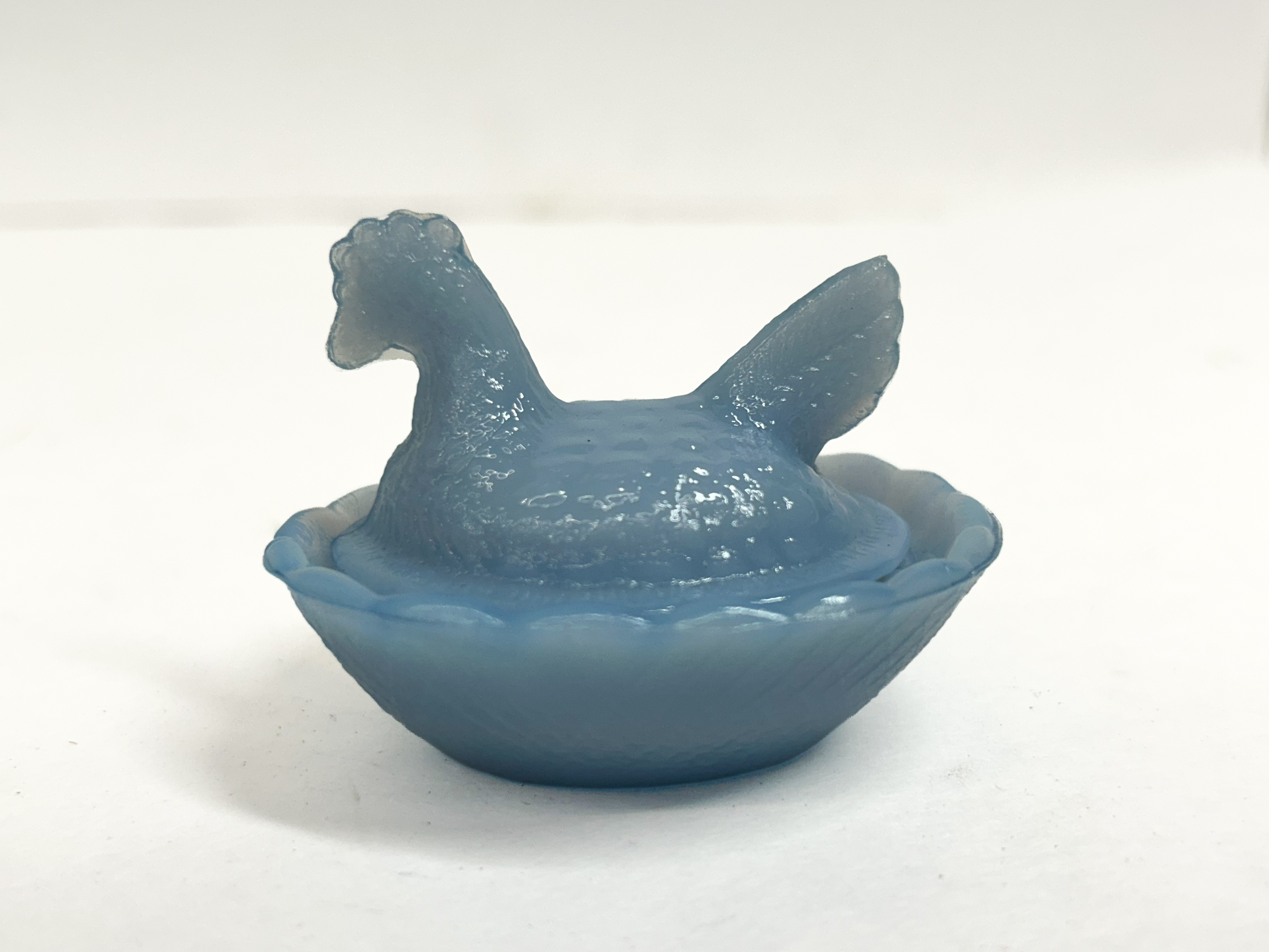 BLUE GLASS HEN ON NEST