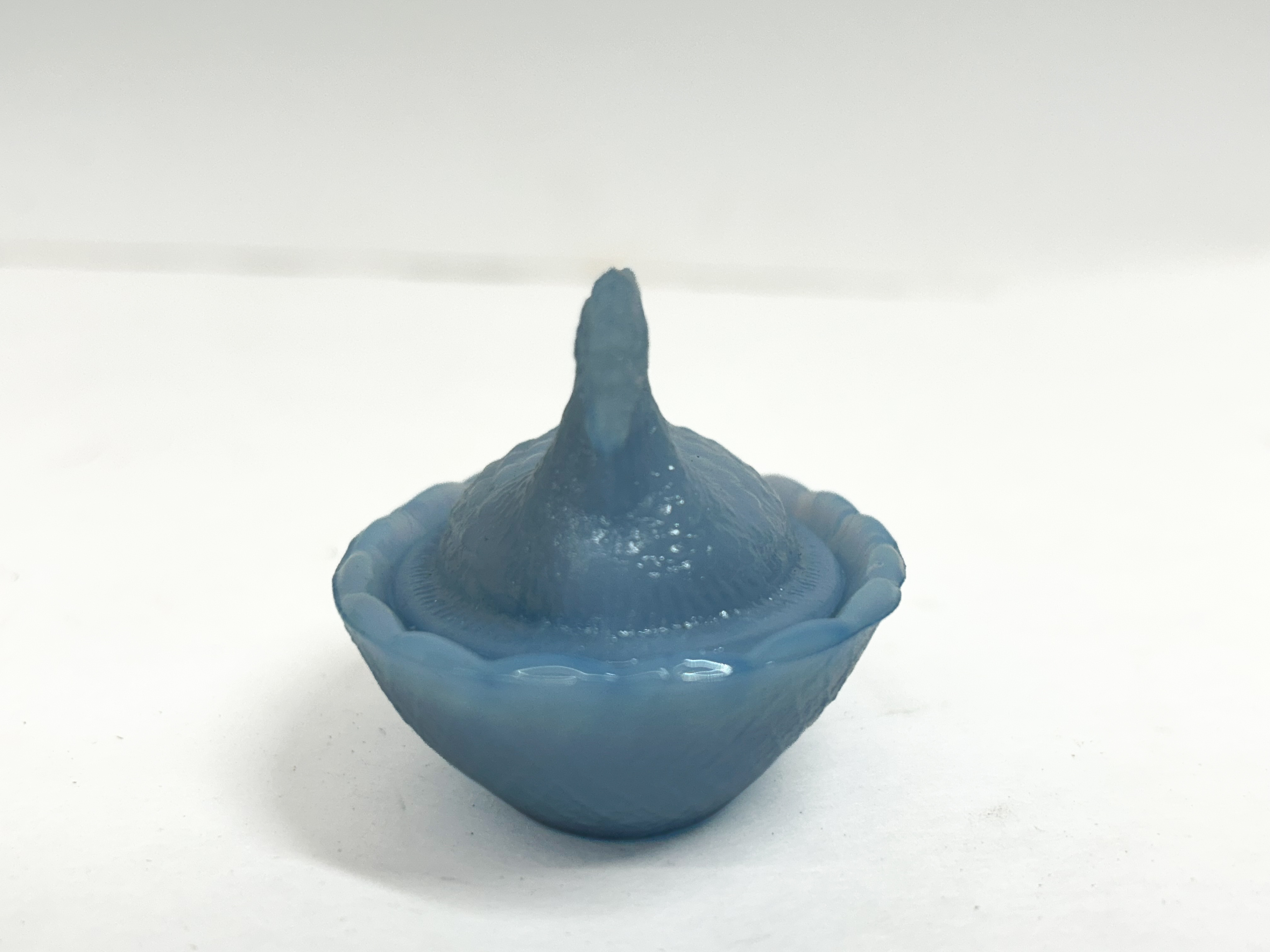 BLUE GLASS HEN ON NEST
