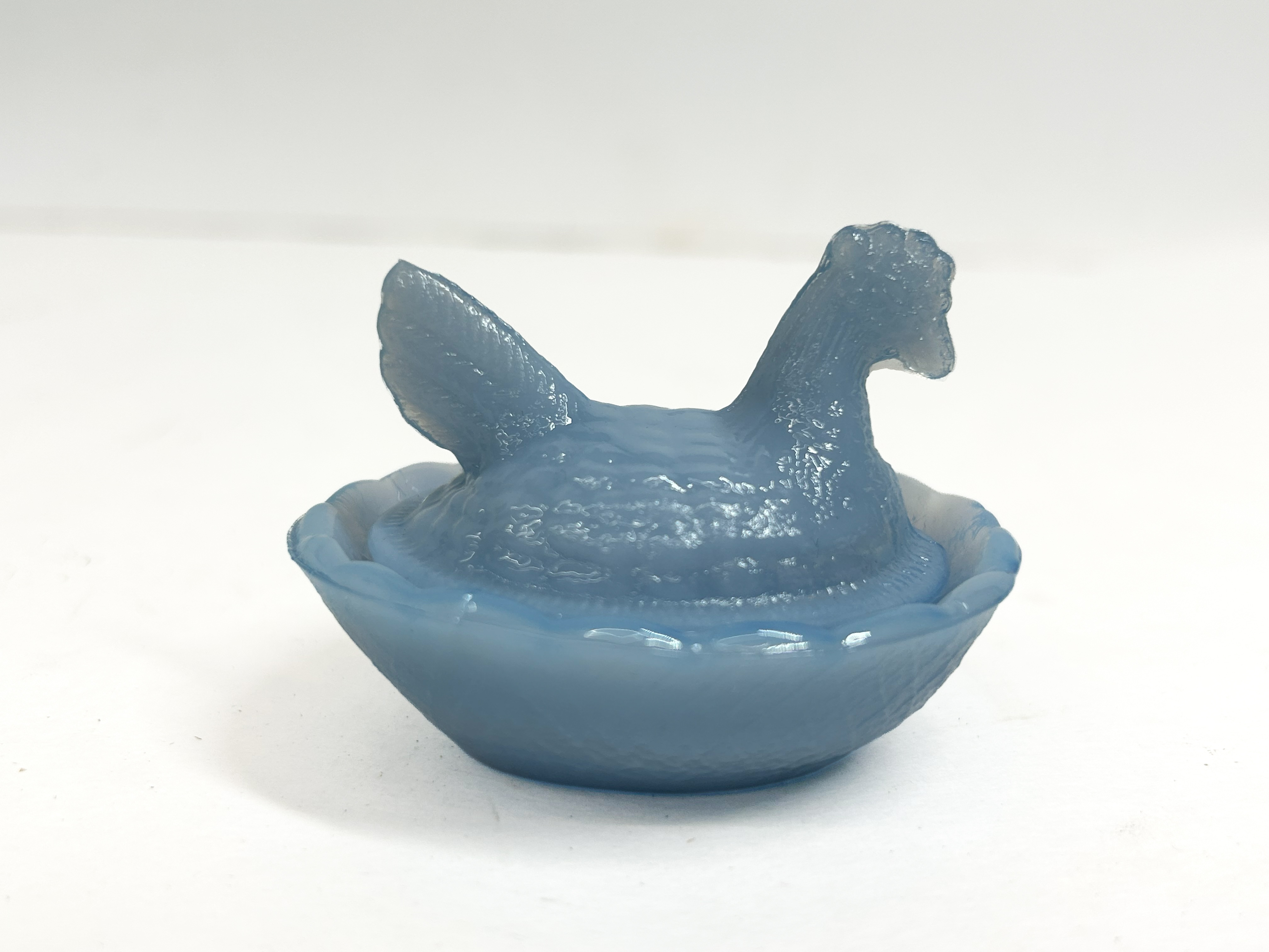 BLUE GLASS HEN ON NEST