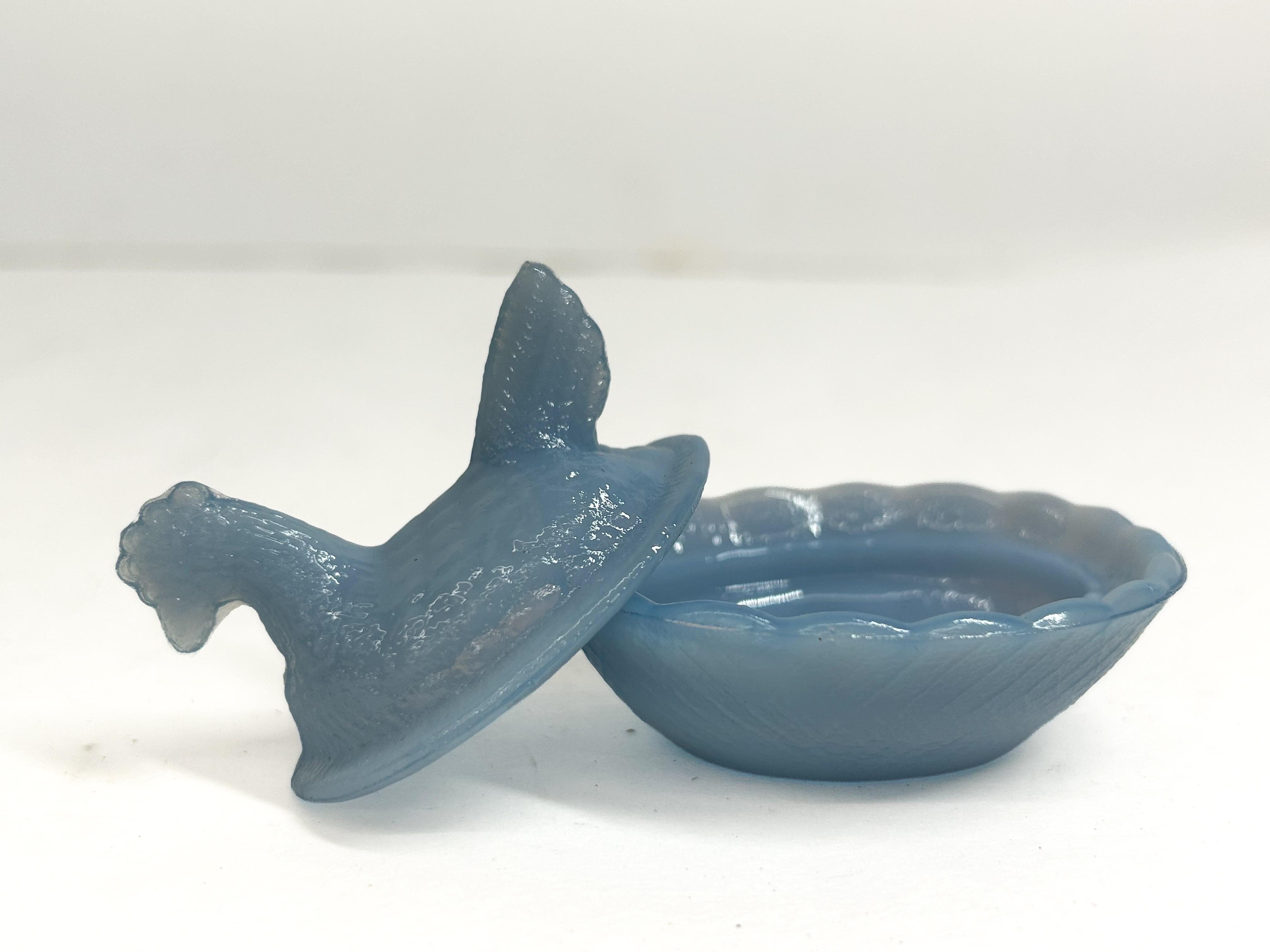 BLUE GLASS HEN ON NEST