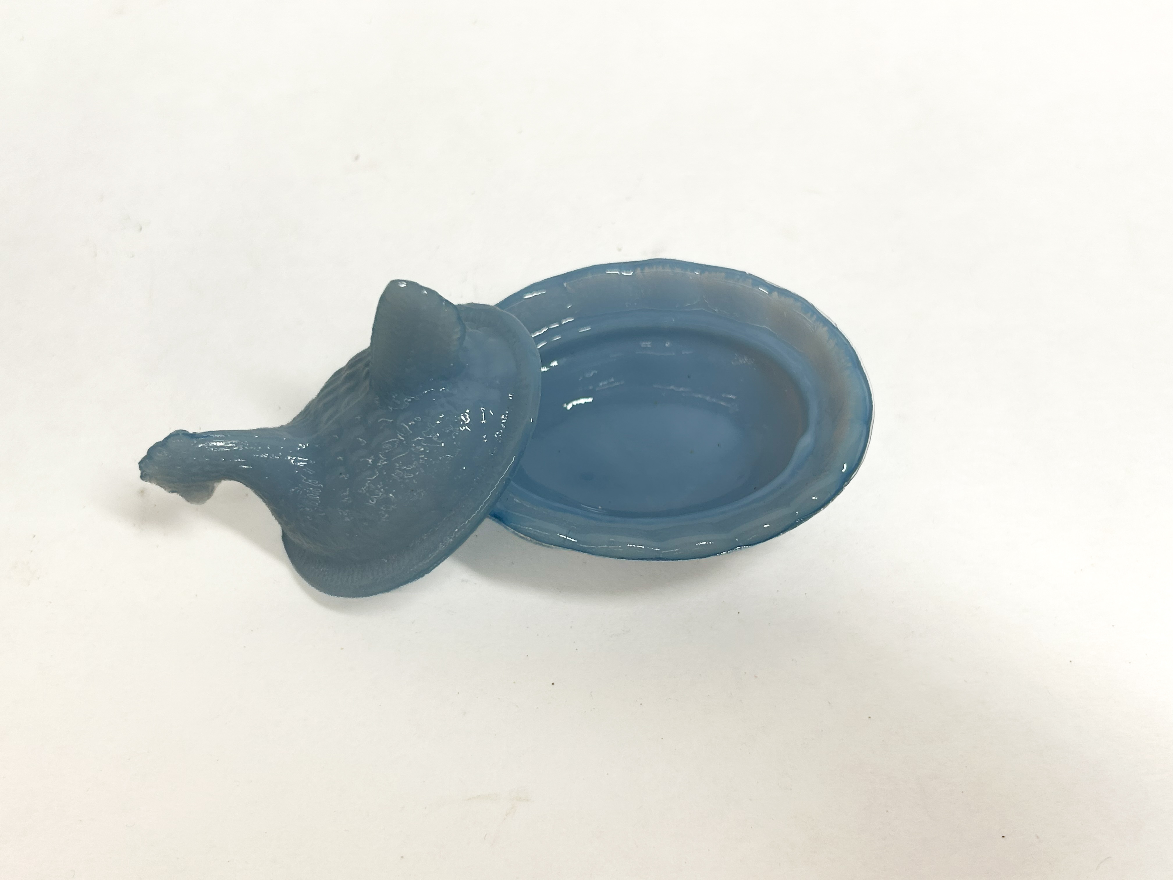 BLUE GLASS HEN ON NEST
