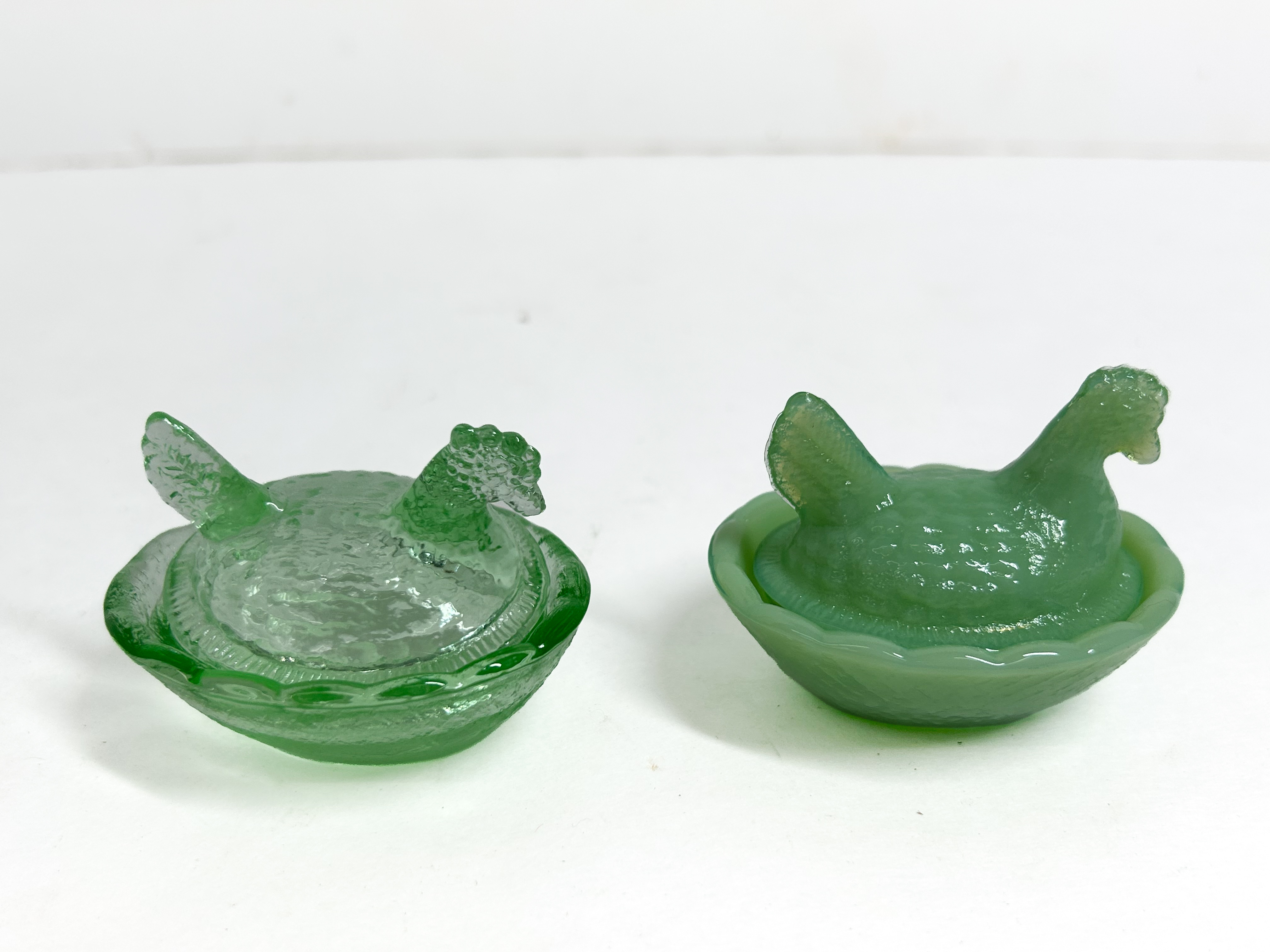 GREEN GLASS MINIATURE HEN-ON-NESTS, MID-20TH CENTURY