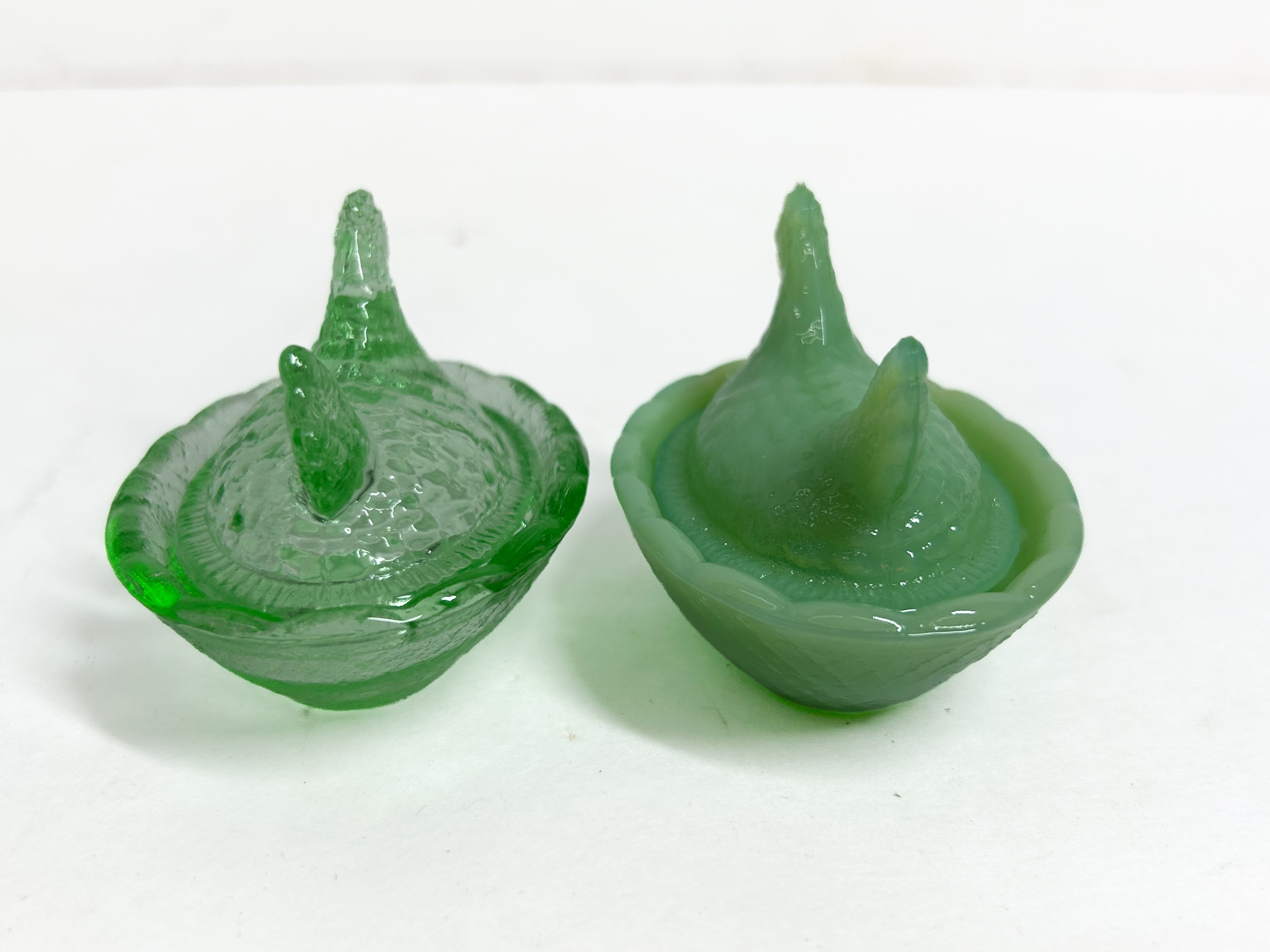 GREEN GLASS MINIATURE HEN-ON-NESTS, MID-20TH CENTURY