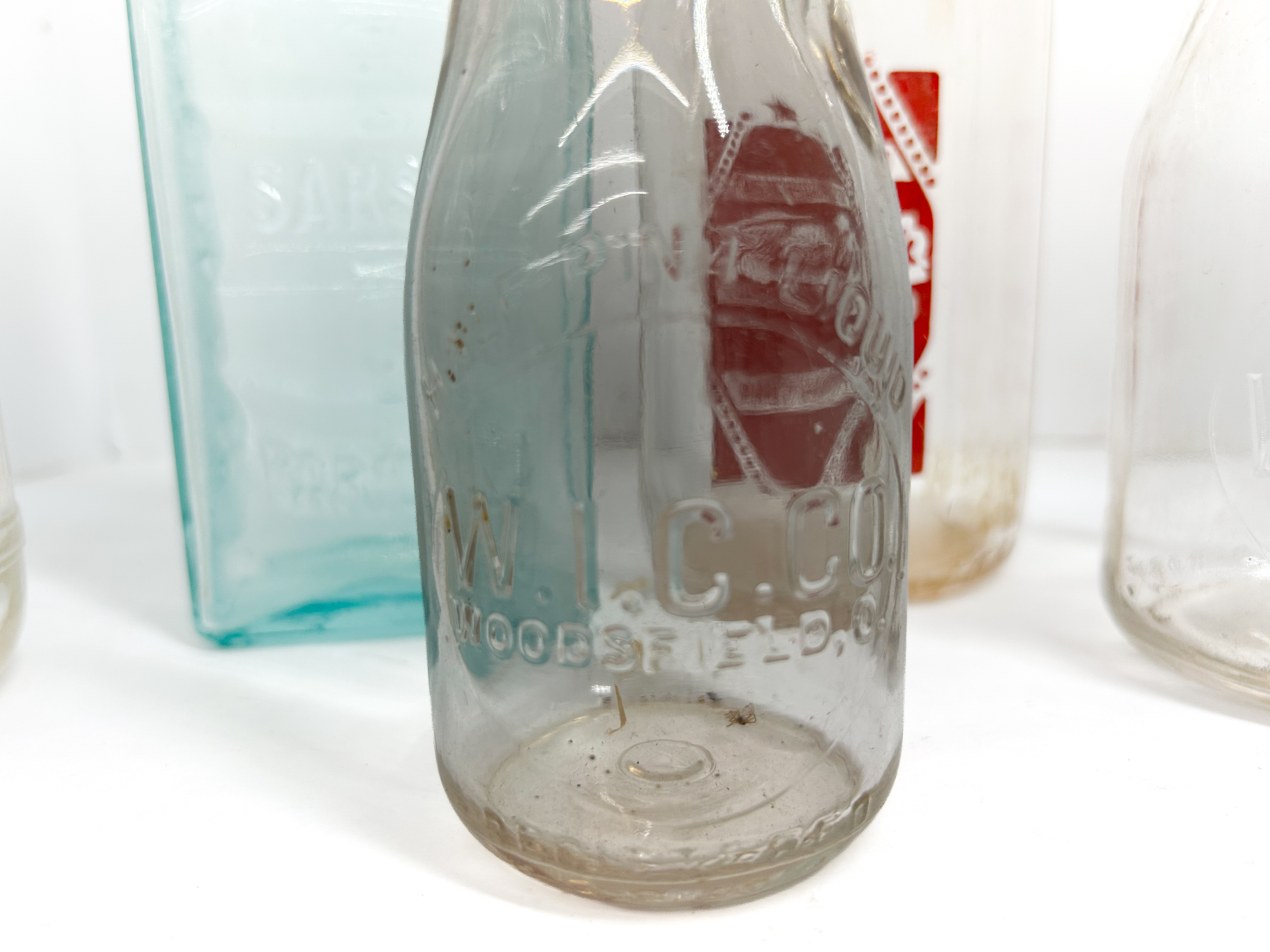 VARIOUS MAKERS, GLASS ADVERTISING BOTTLES, 1900-1950