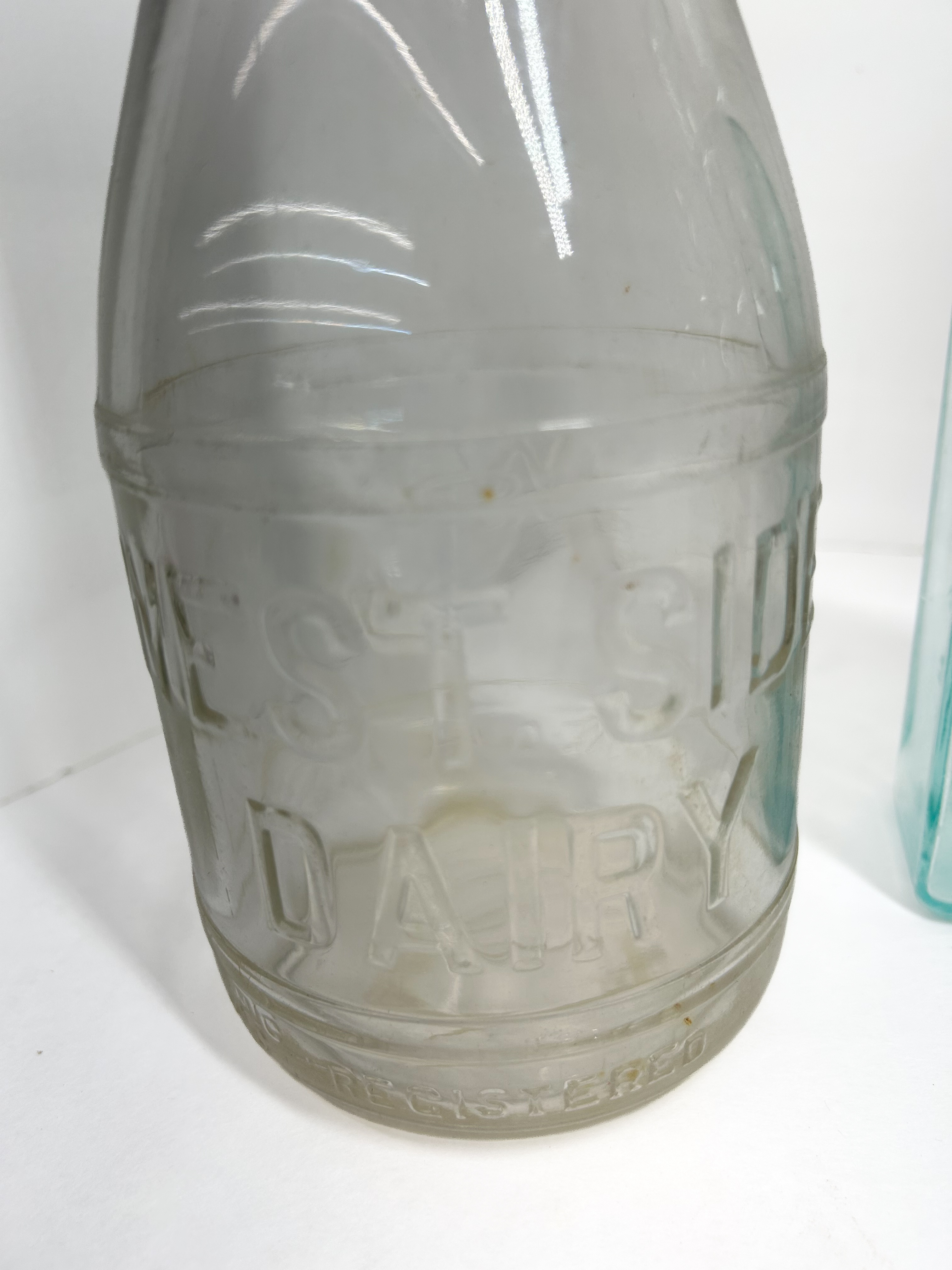 VARIOUS MAKERS, GLASS ADVERTISING BOTTLES, 1900-1950