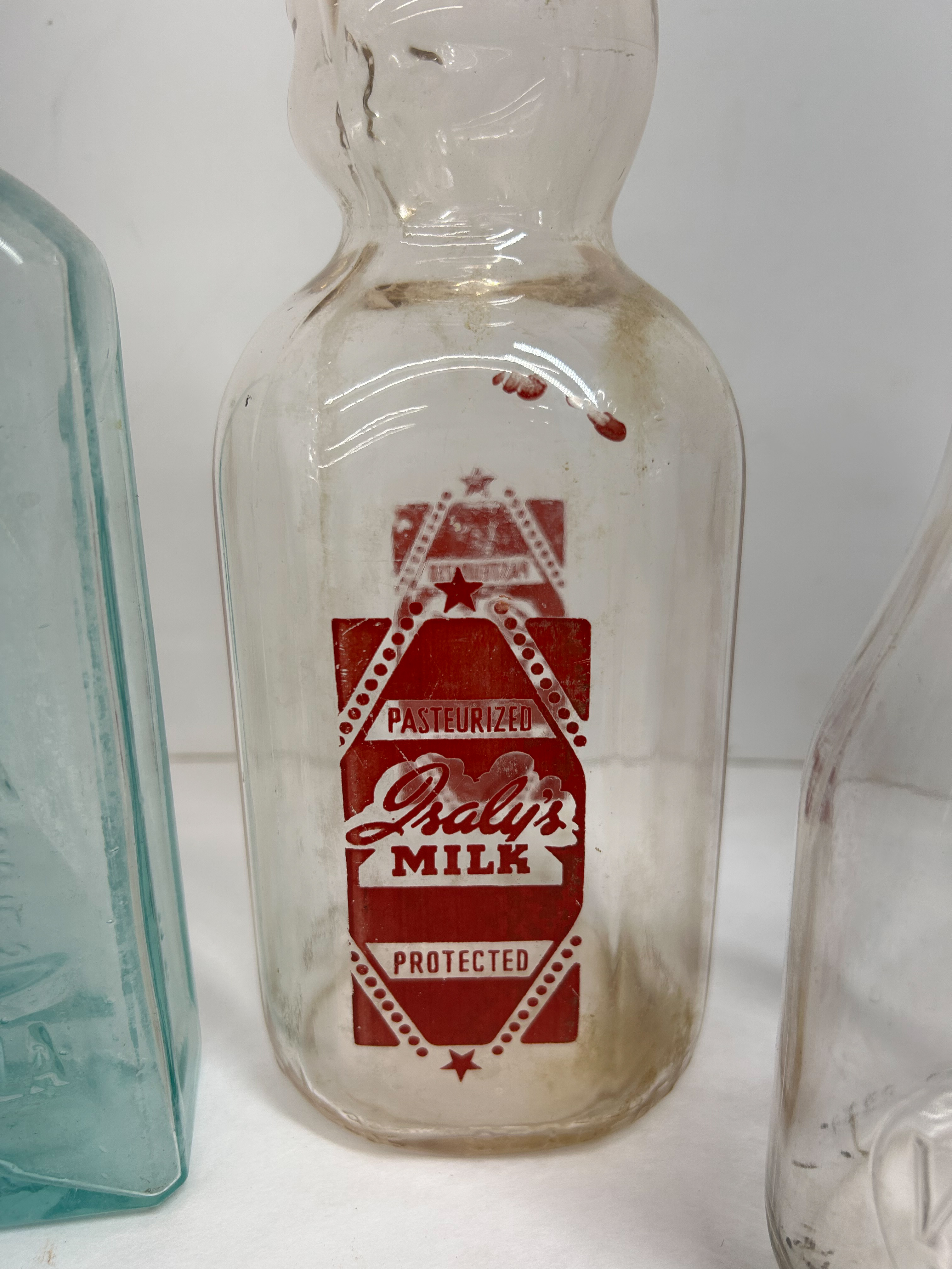 VARIOUS MAKERS, GLASS ADVERTISING BOTTLES, 1900-1950