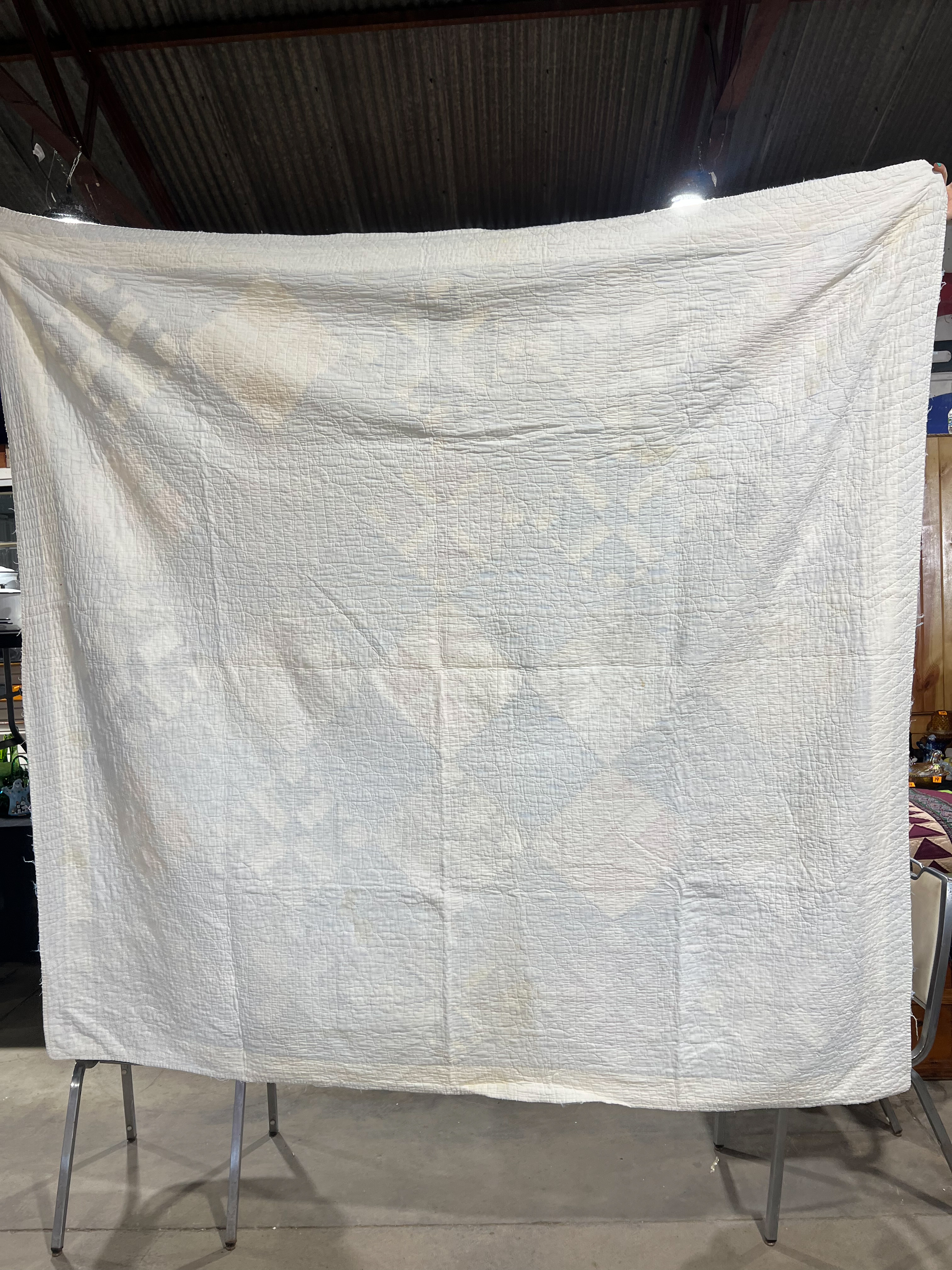 Two Vintage Hand-Stitched Cotton Quilts Including Bear Paw and Spool Patterns