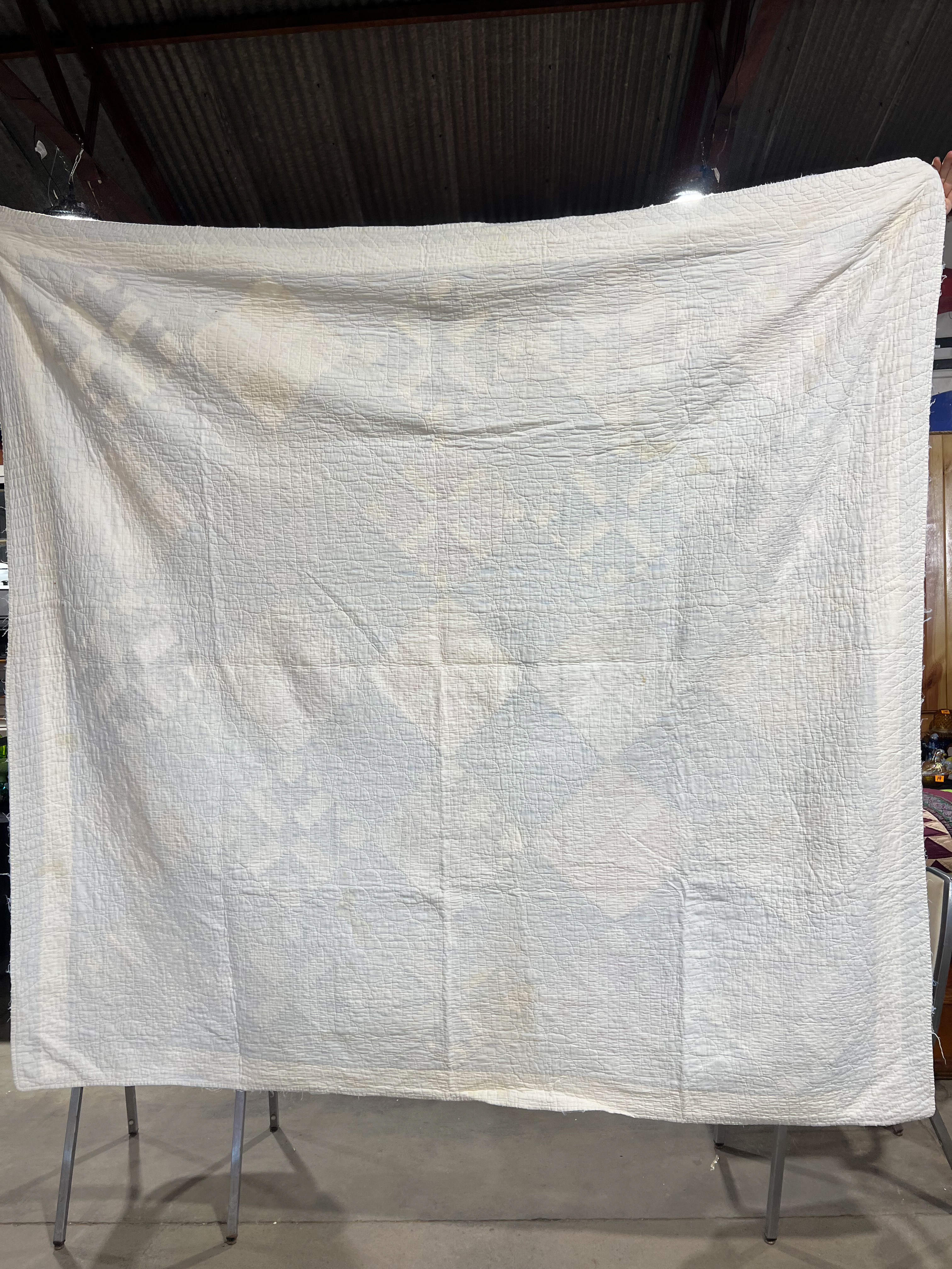 Two Vintage Hand-Stitched Cotton Quilts Including Bear Paw and Spool Patterns