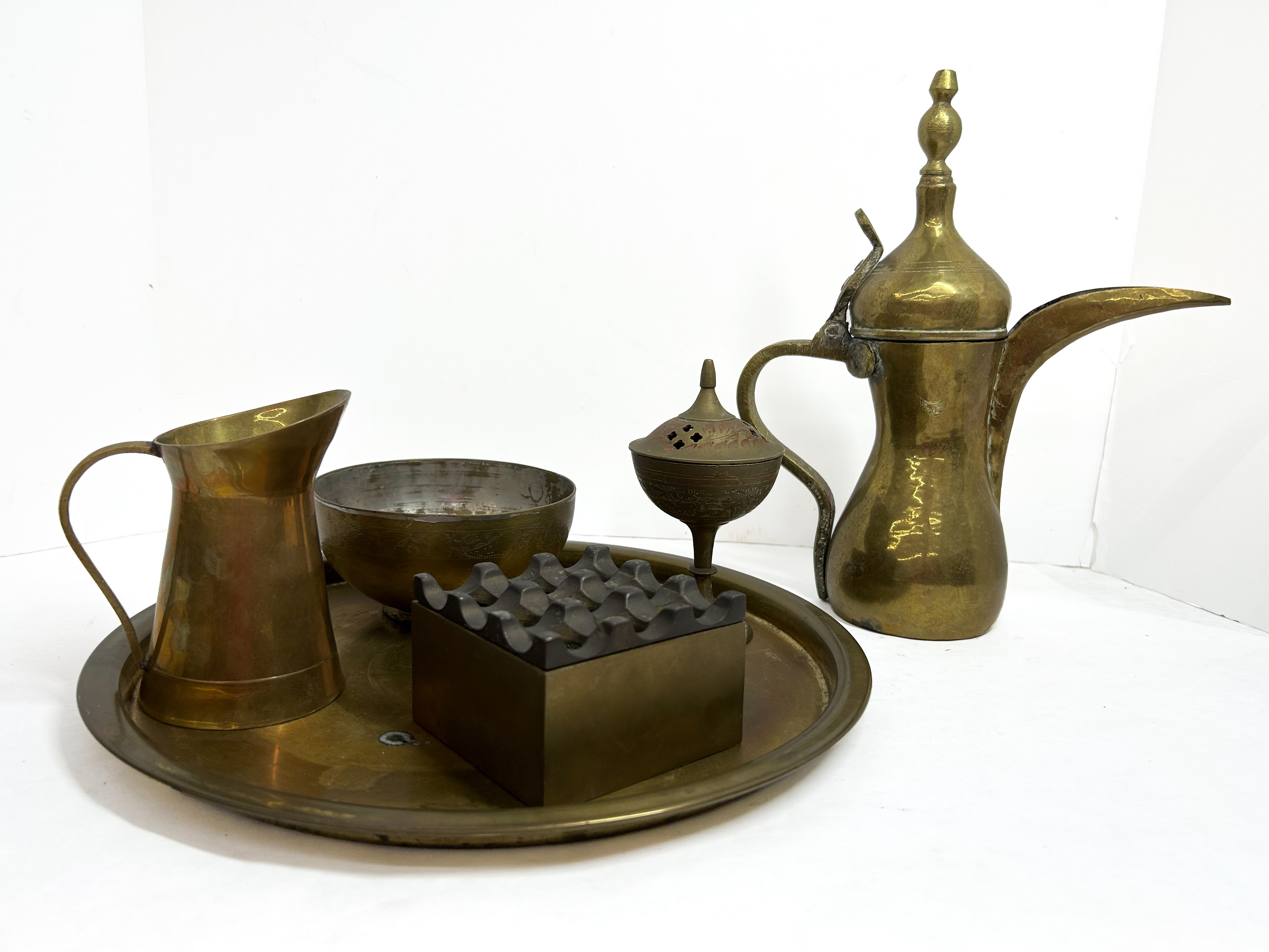 ISLAMIC BRASS SERVICE COLLECTION, 20TH CENTURY