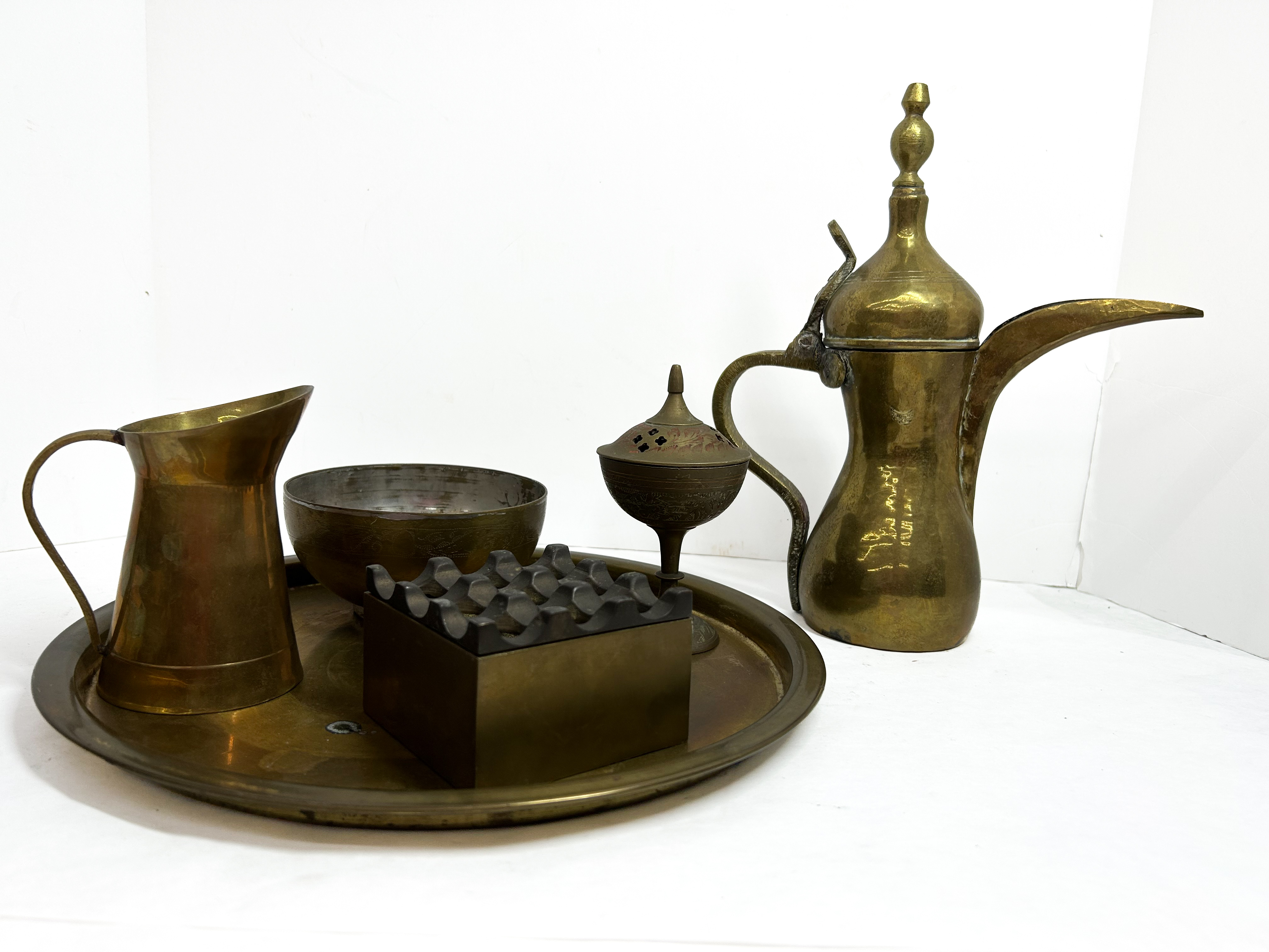 ISLAMIC BRASS SERVICE COLLECTION, 20TH CENTURY
