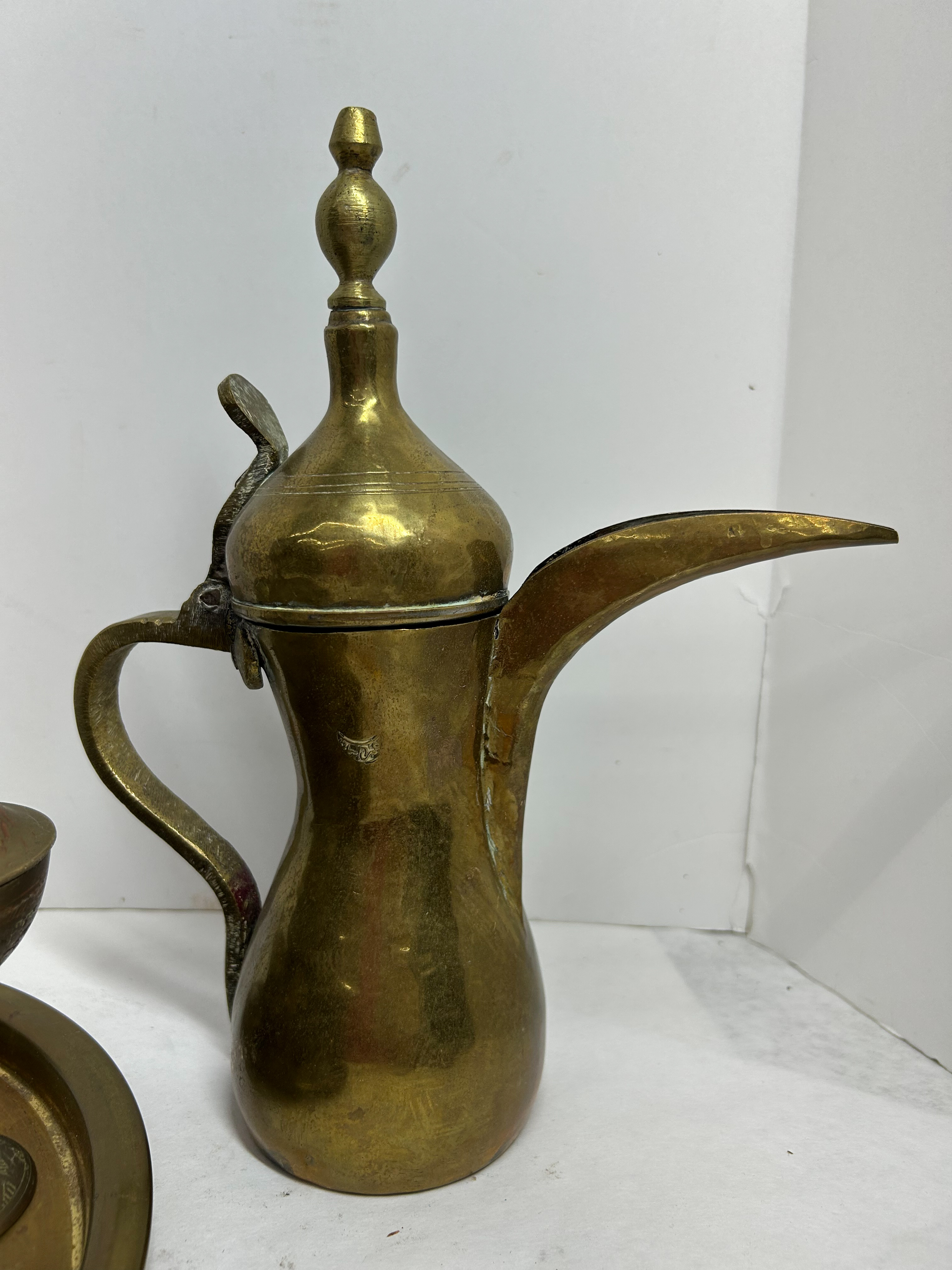 ISLAMIC BRASS SERVICE COLLECTION, 20TH CENTURY