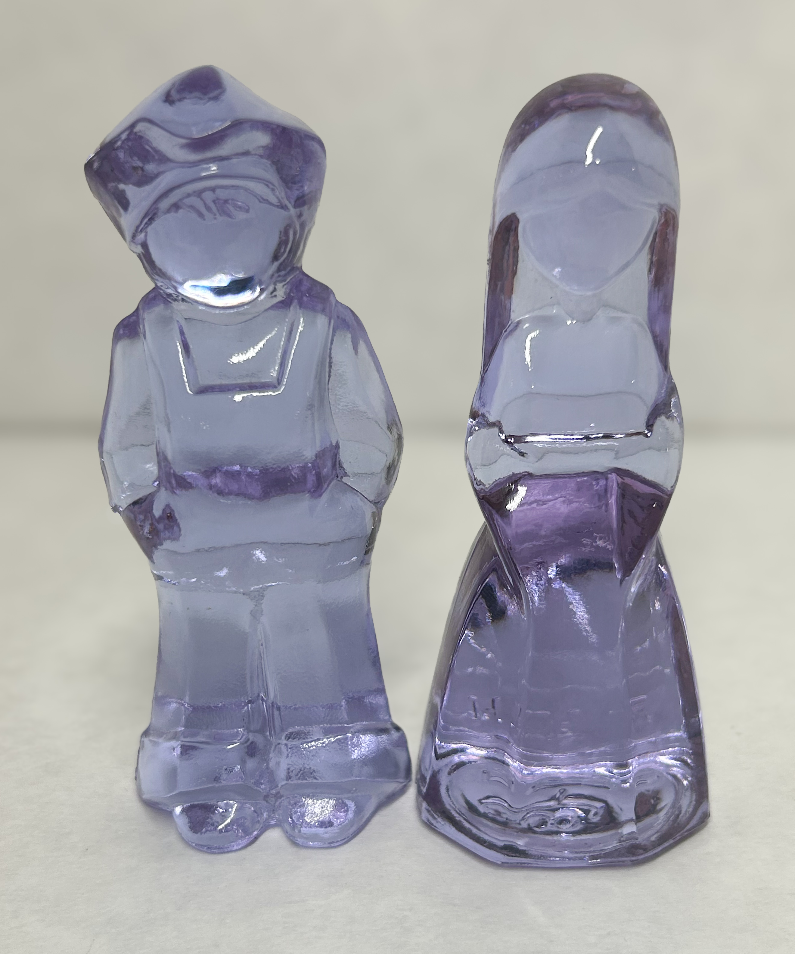 MOSSER PAIR OF LAVENDER GLASS JENNY AND JOSH