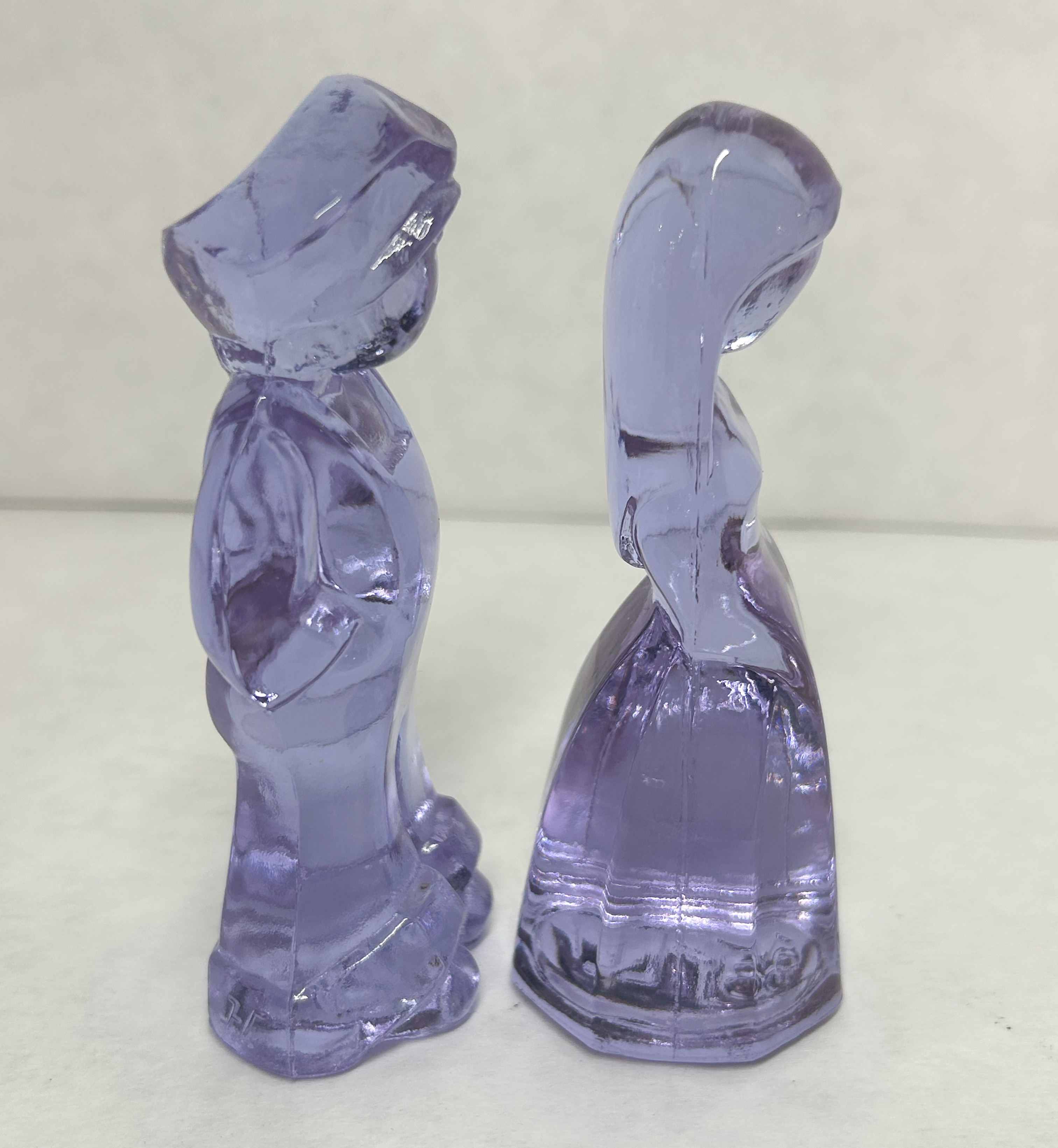 MOSSER PAIR OF LAVENDER GLASS JENNY AND JOSH