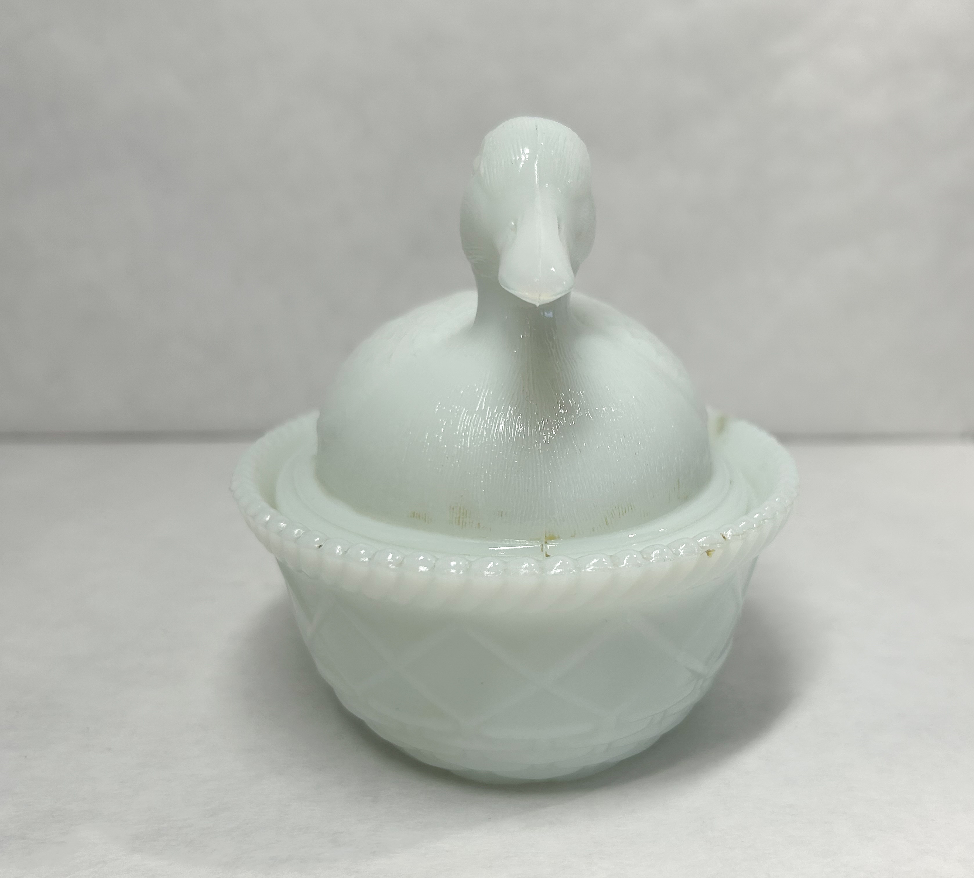 AMERICAN MILK GLASS DUCK, 20TH CENTURY