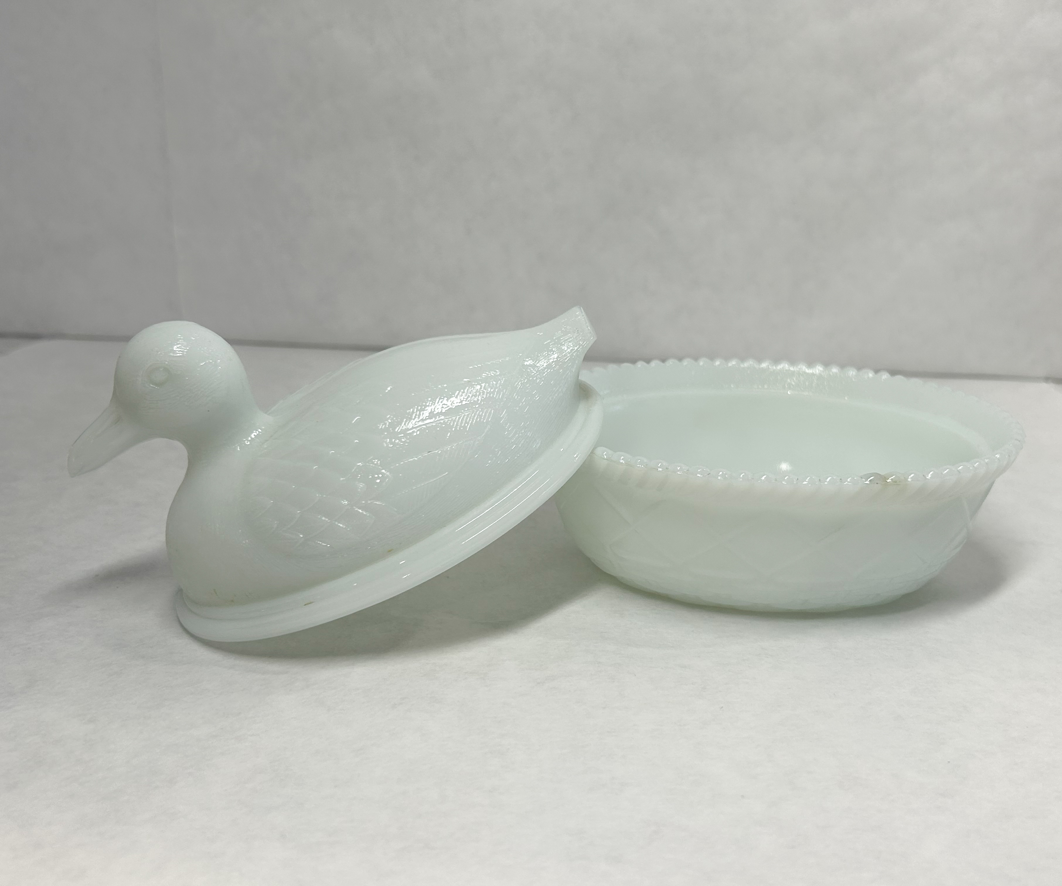 AMERICAN MILK GLASS DUCK, 20TH CENTURY