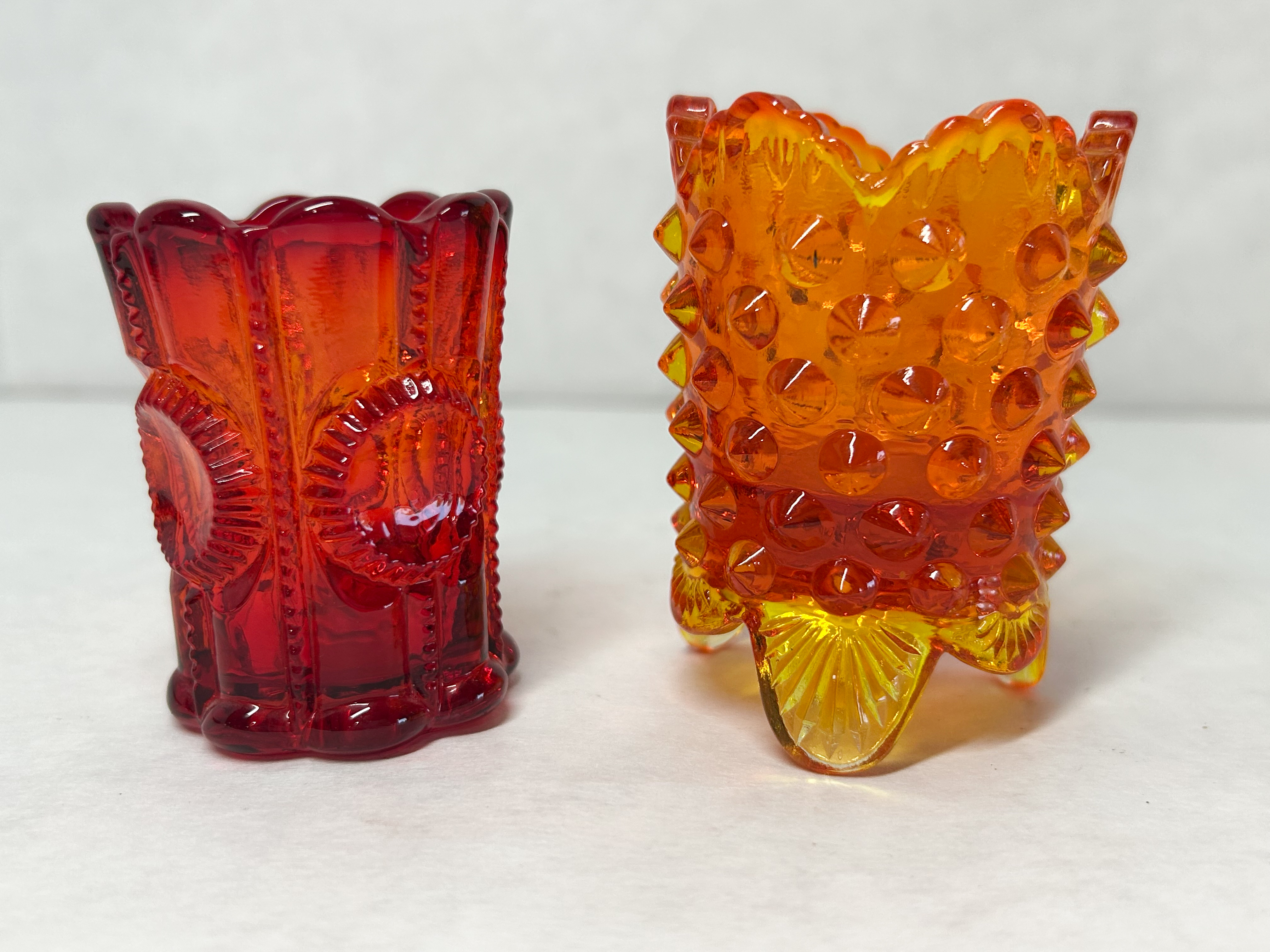 TWO AMBERINA GLASS TOOTHPICK HOLDERS, MID-20TH CENTURY