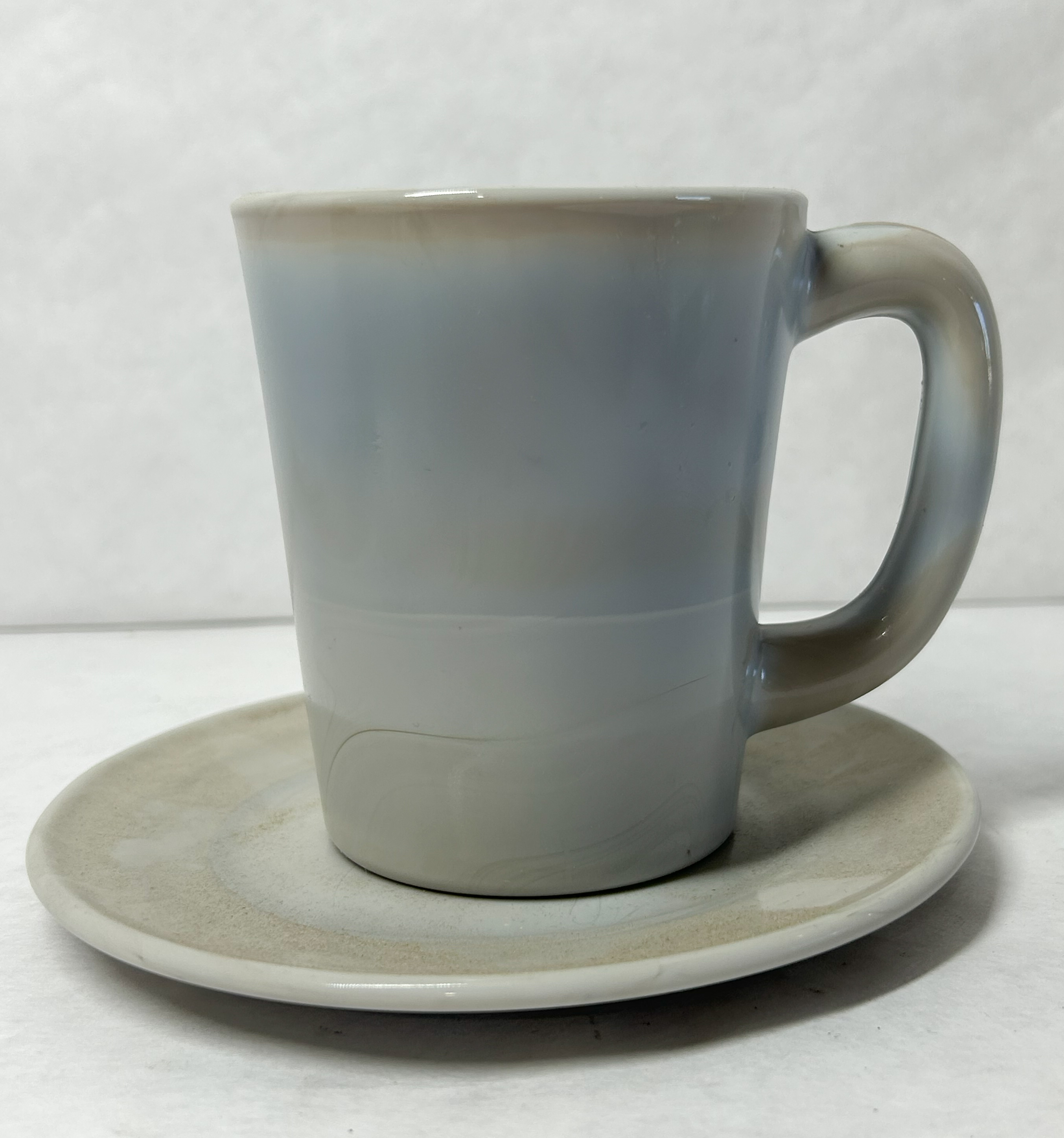 MOSSER MARBLE MUG AND SAUCER