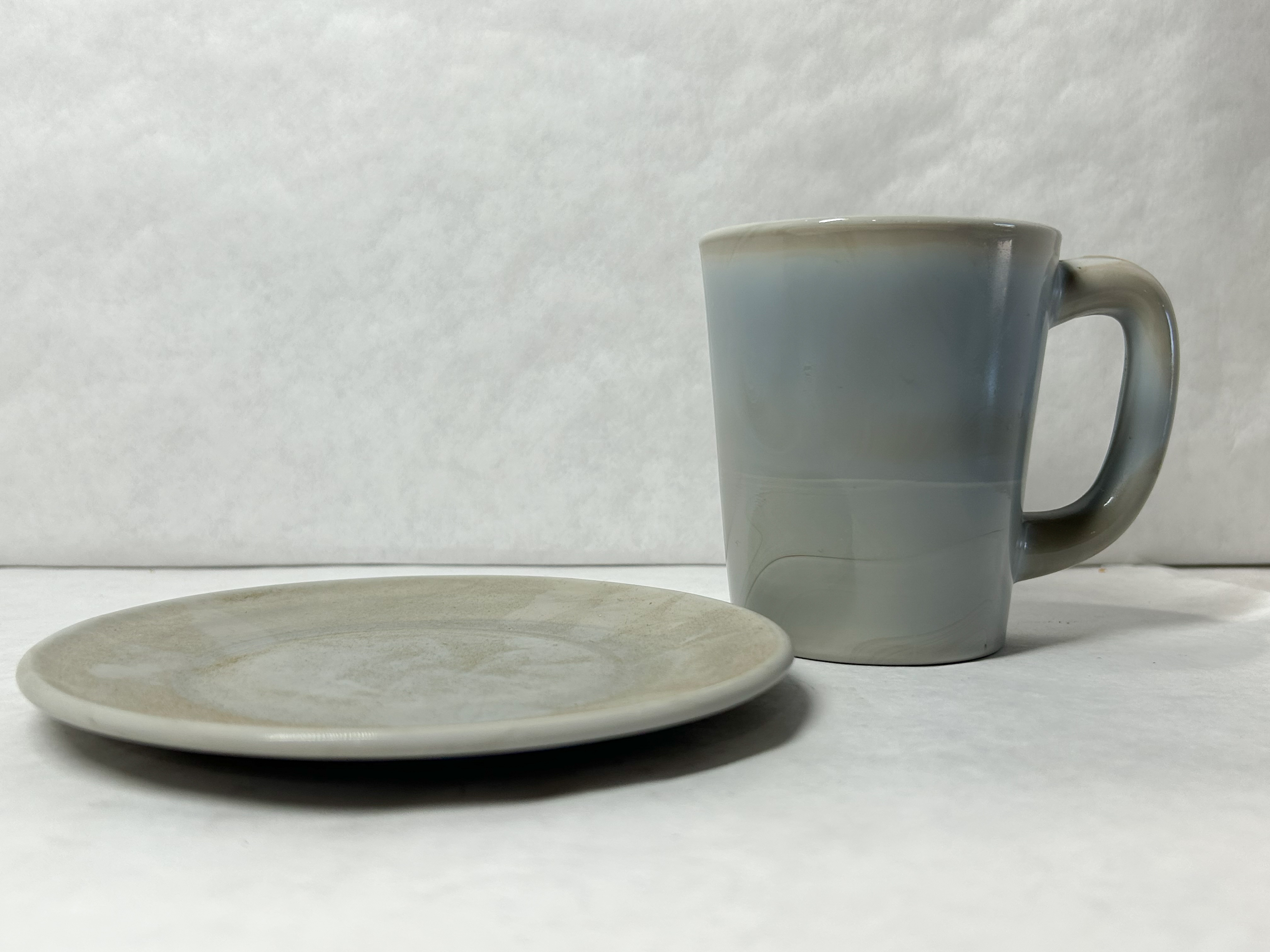 MOSSER MARBLE MUG AND SAUCER