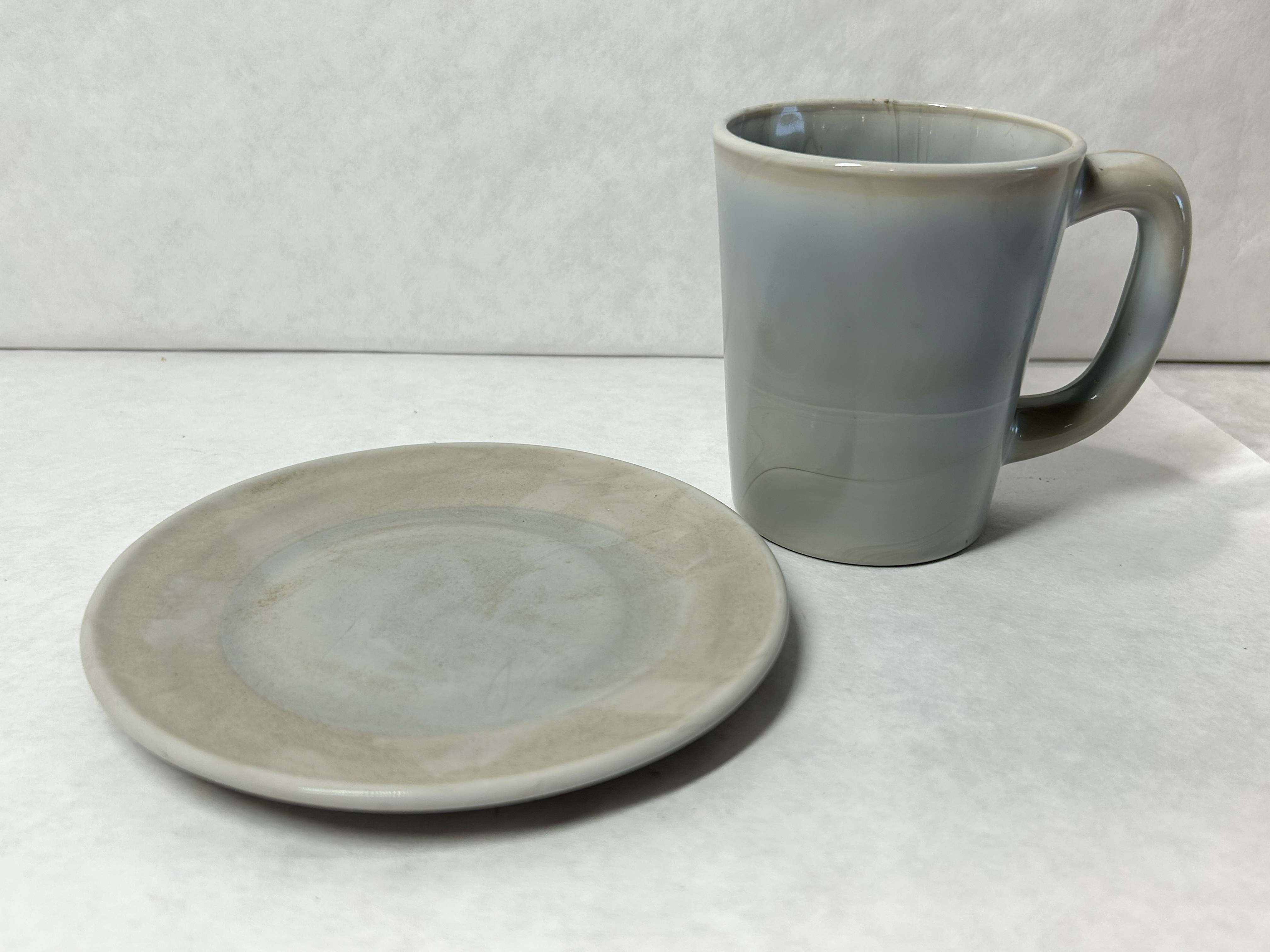 MOSSER MARBLE MUG AND SAUCER
