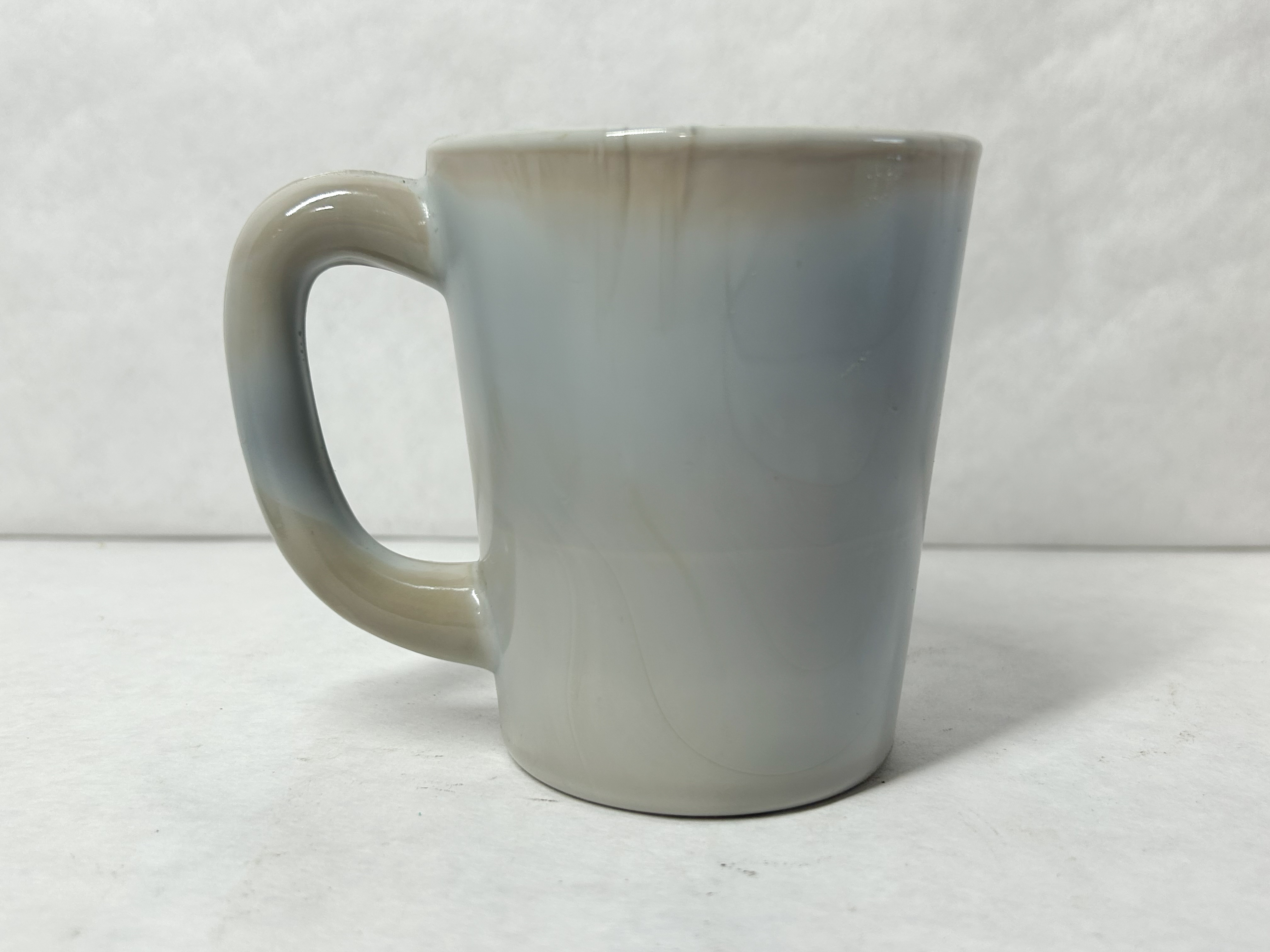 MOSSER MARBLE MUG AND SAUCER