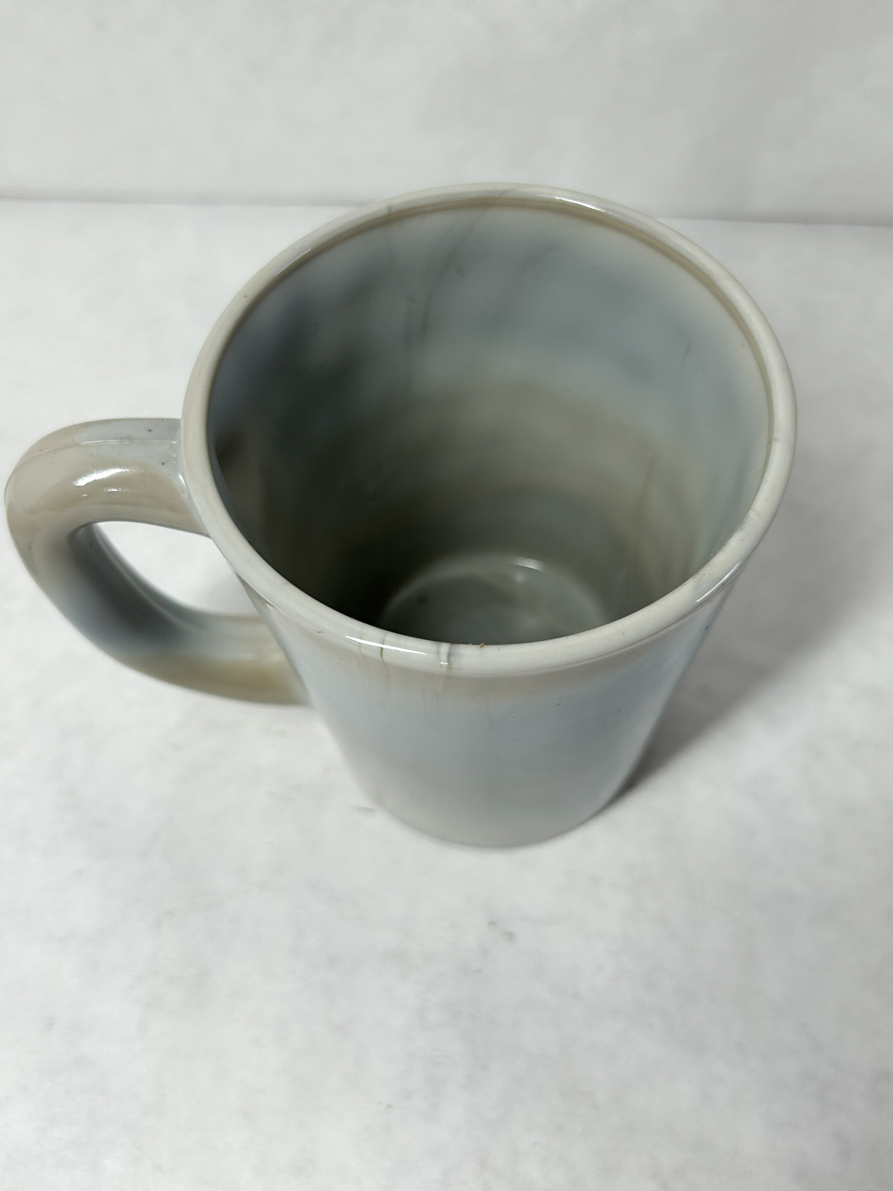 MOSSER MARBLE MUG AND SAUCER