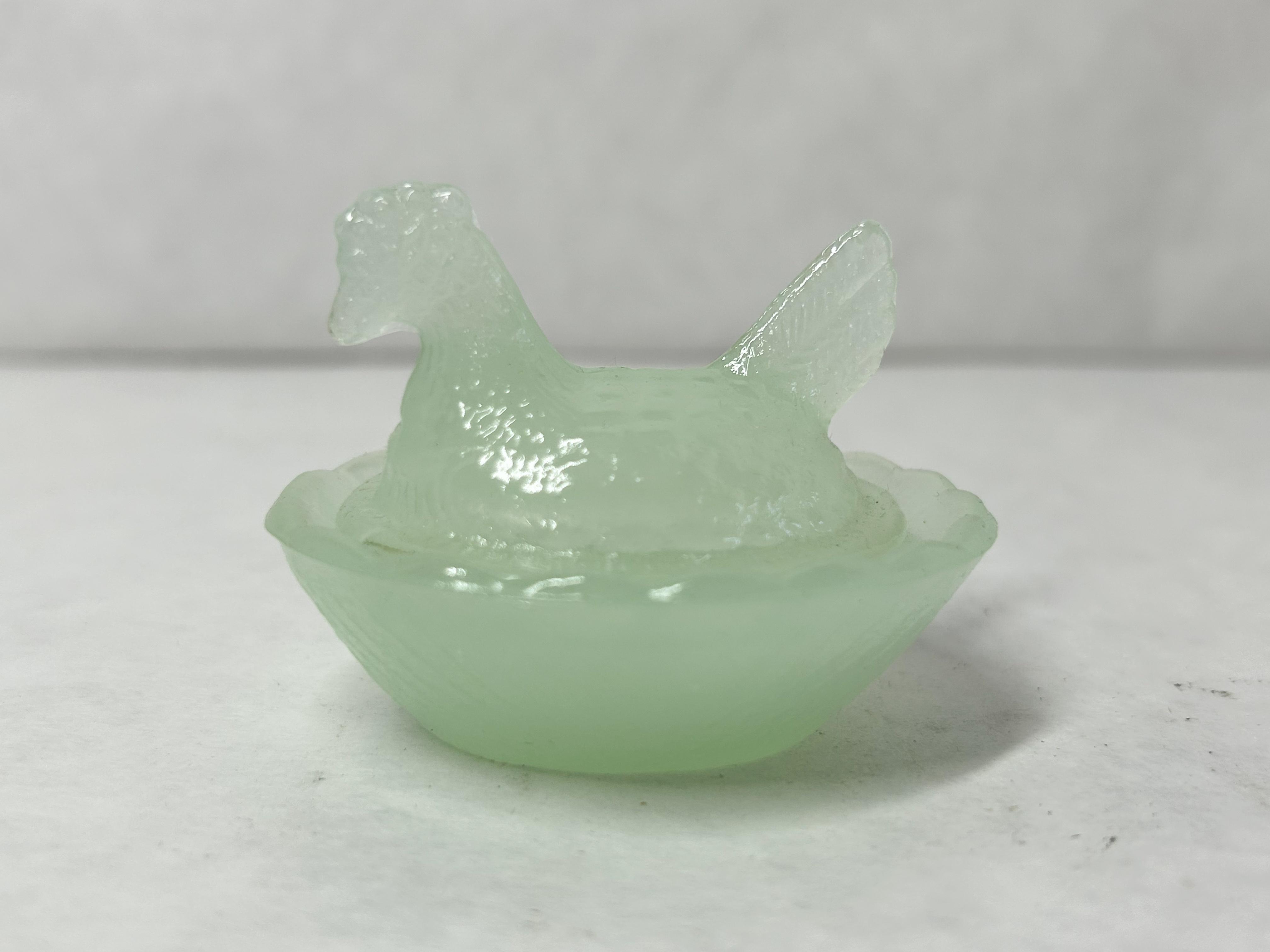 MINIATURE JADEITE GLASS HEN ON NEST