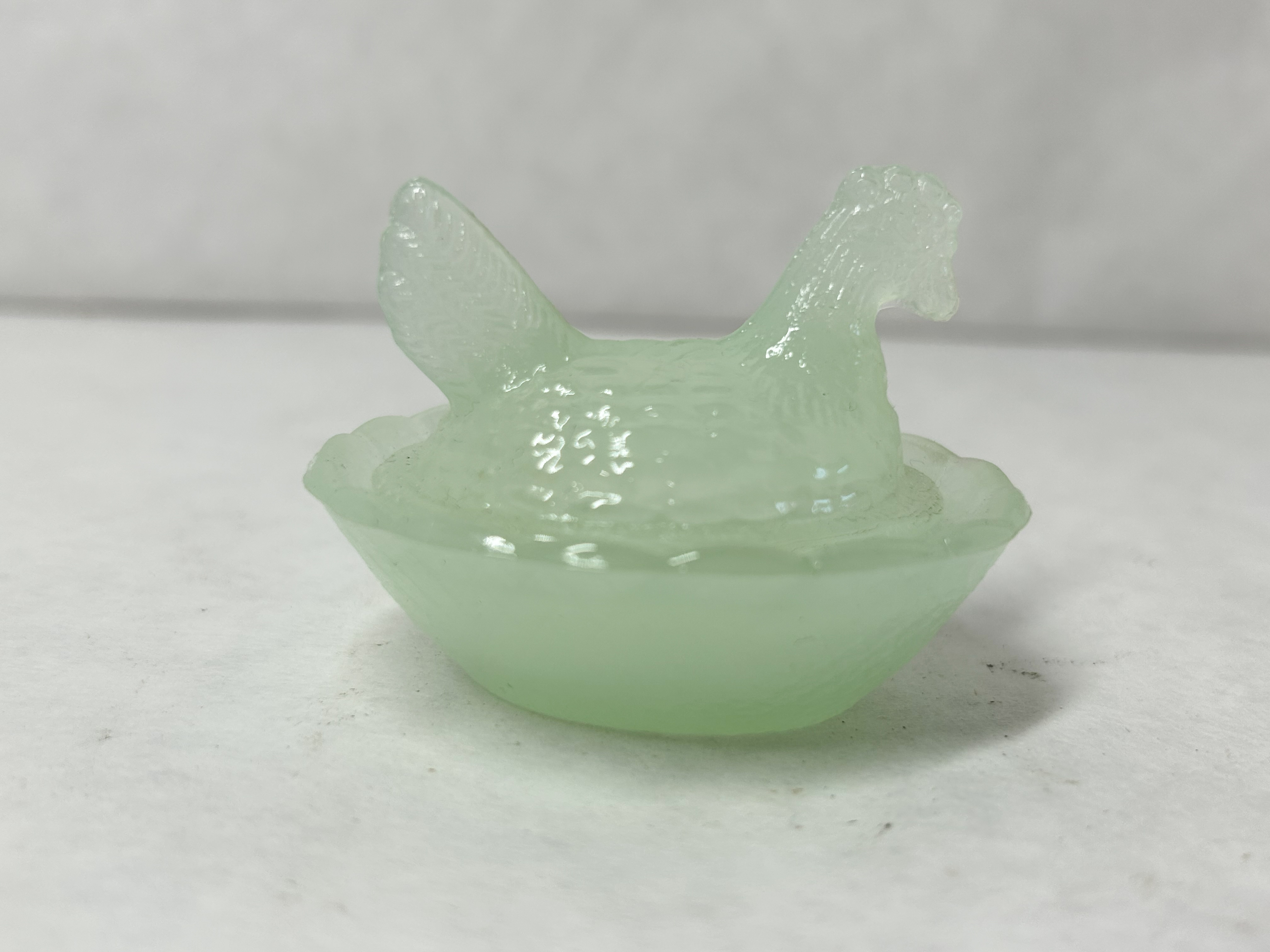 MINIATURE JADEITE GLASS HEN ON NEST