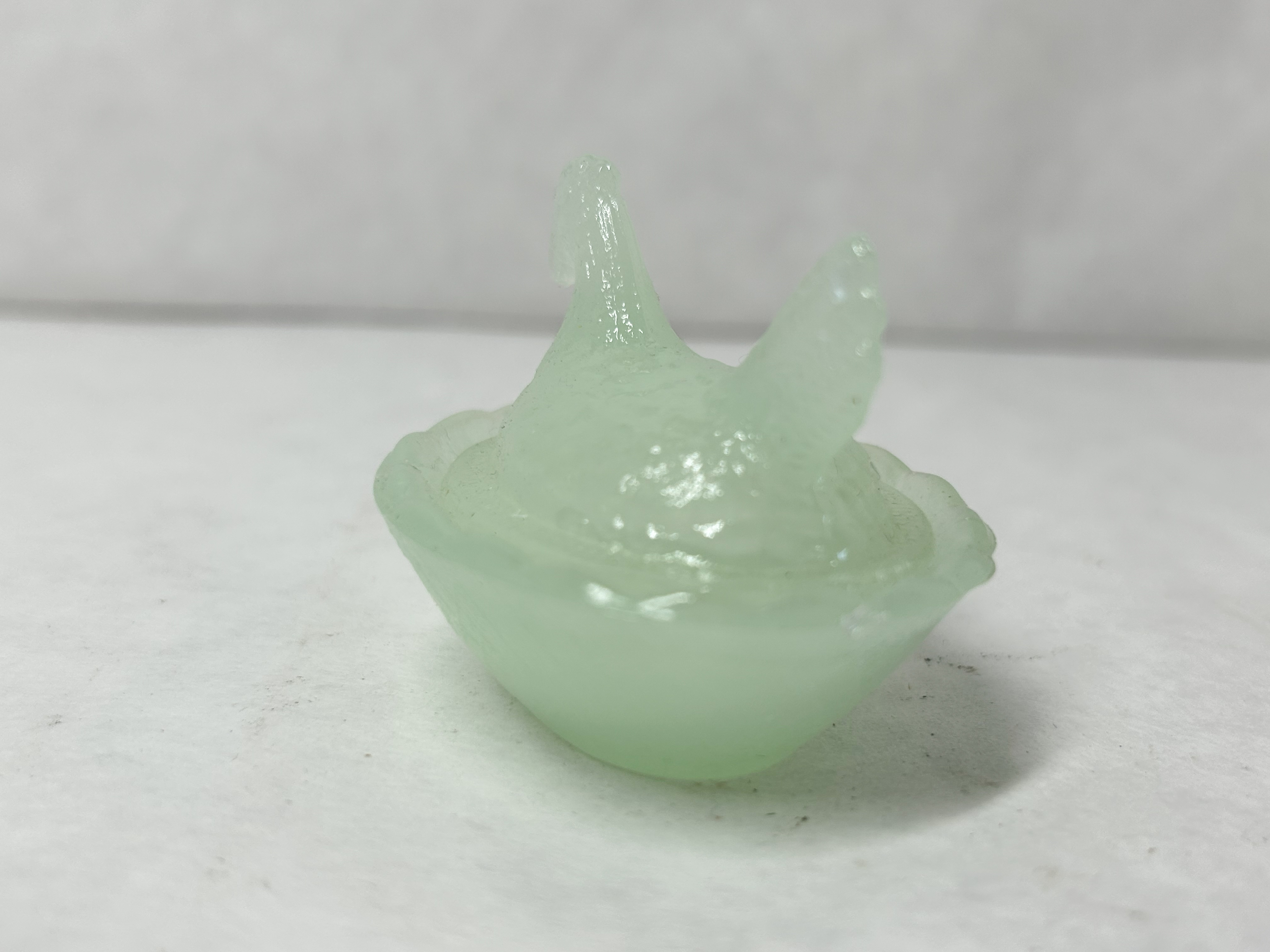 MINIATURE JADEITE GLASS HEN ON NEST