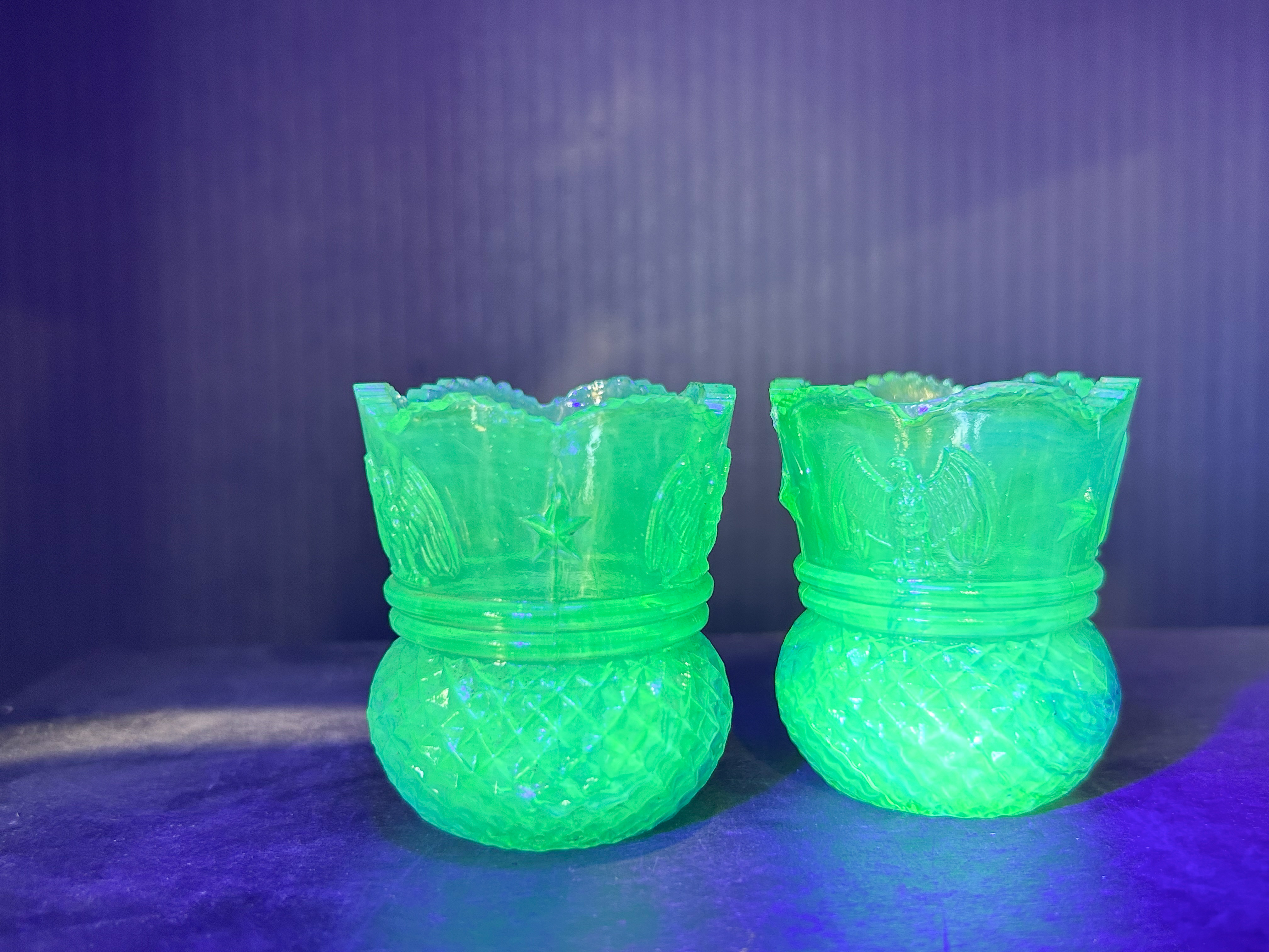 PAIR EAGLE STAR URANIUM GLASS HOLDERS