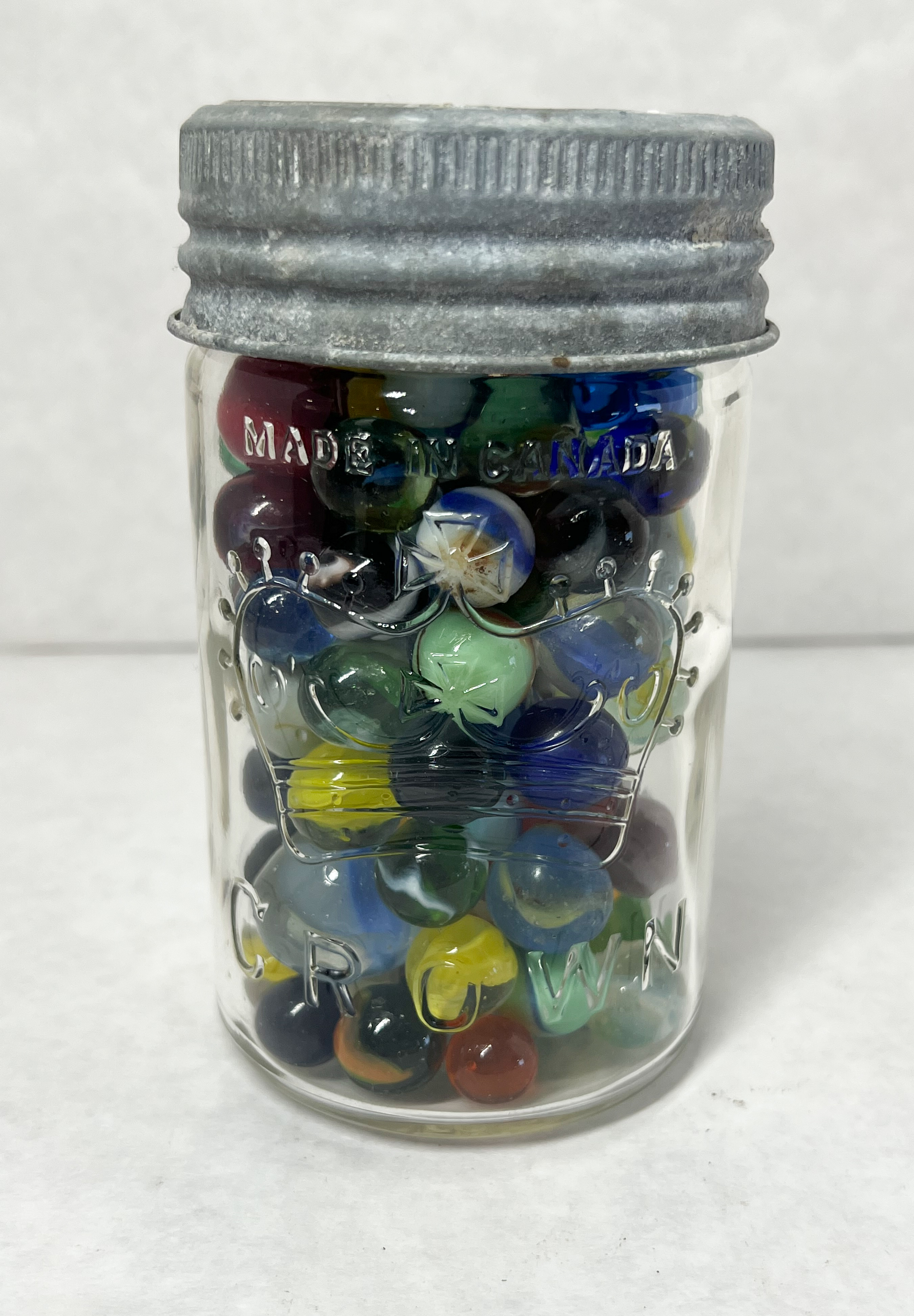 CROWN, MARBLES AND JAR, 20TH CENTURY